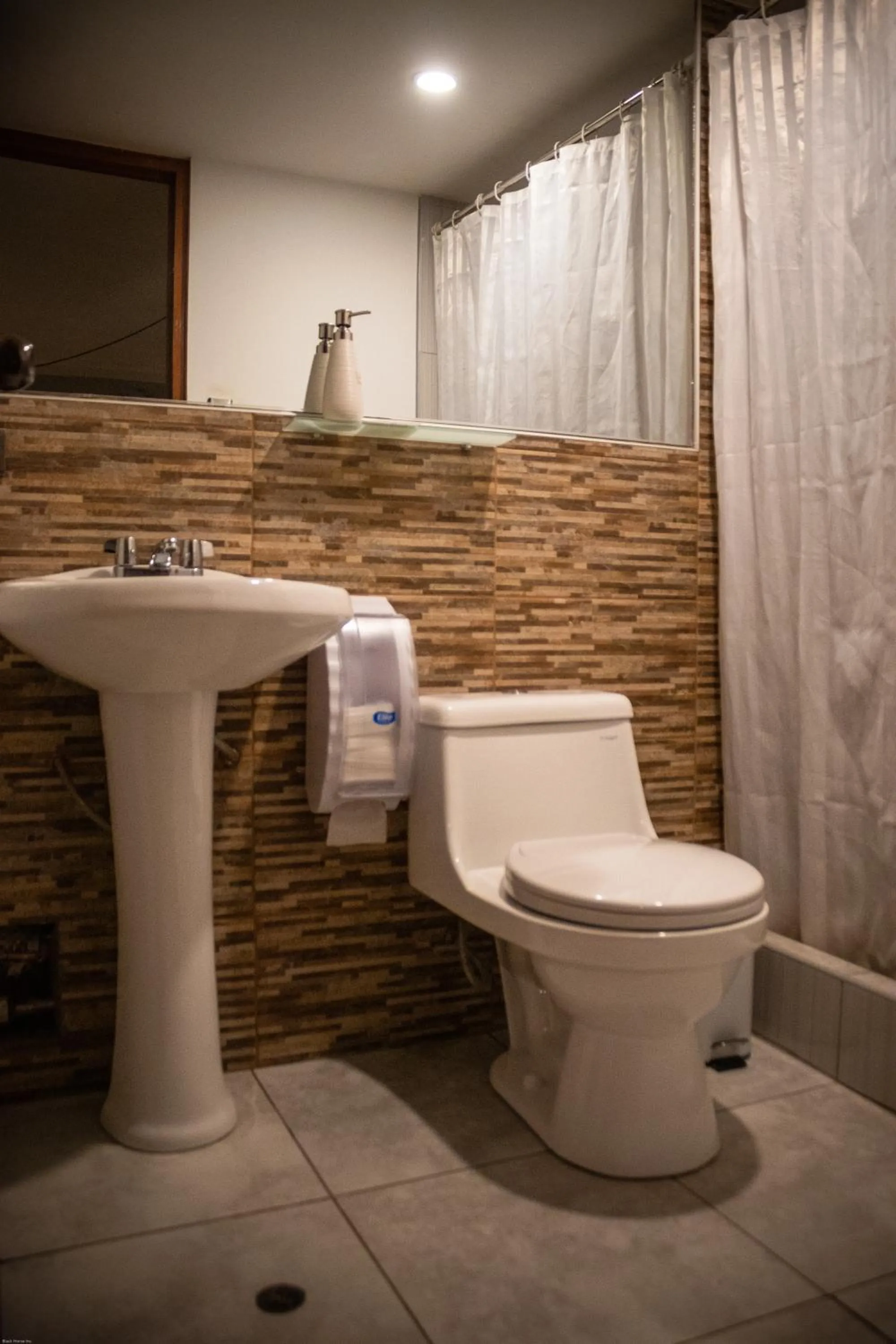 Toilet in Home Garden Hotel