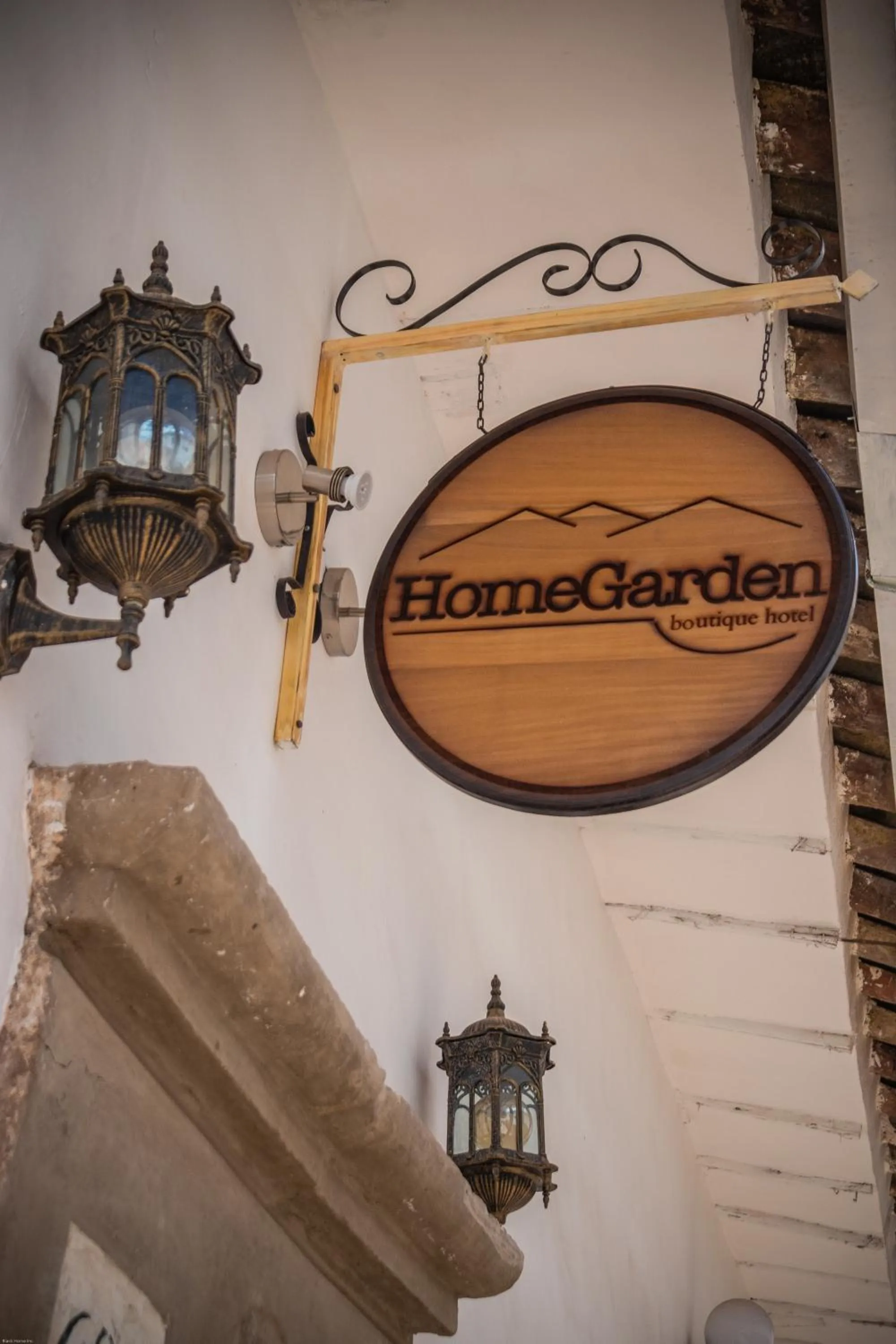 Property logo or sign in Home Garden Hotel