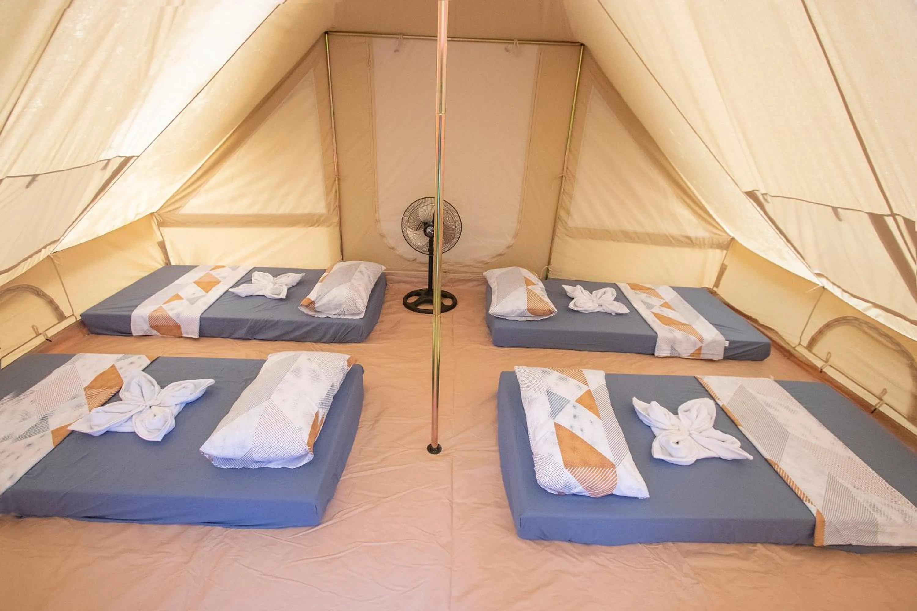 Bed in The Acacia Glamping Park