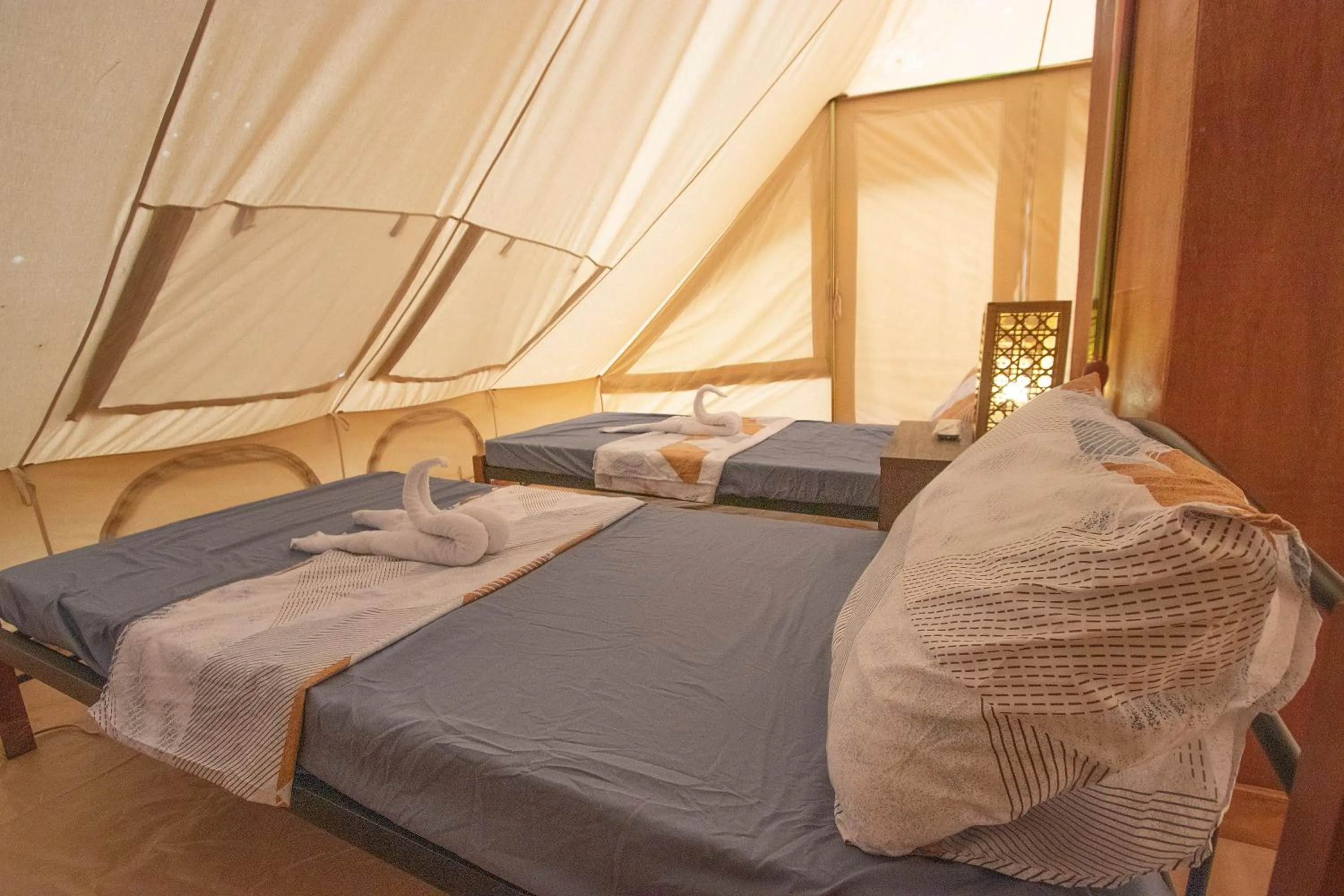 Bed in The Acacia Glamping Park
