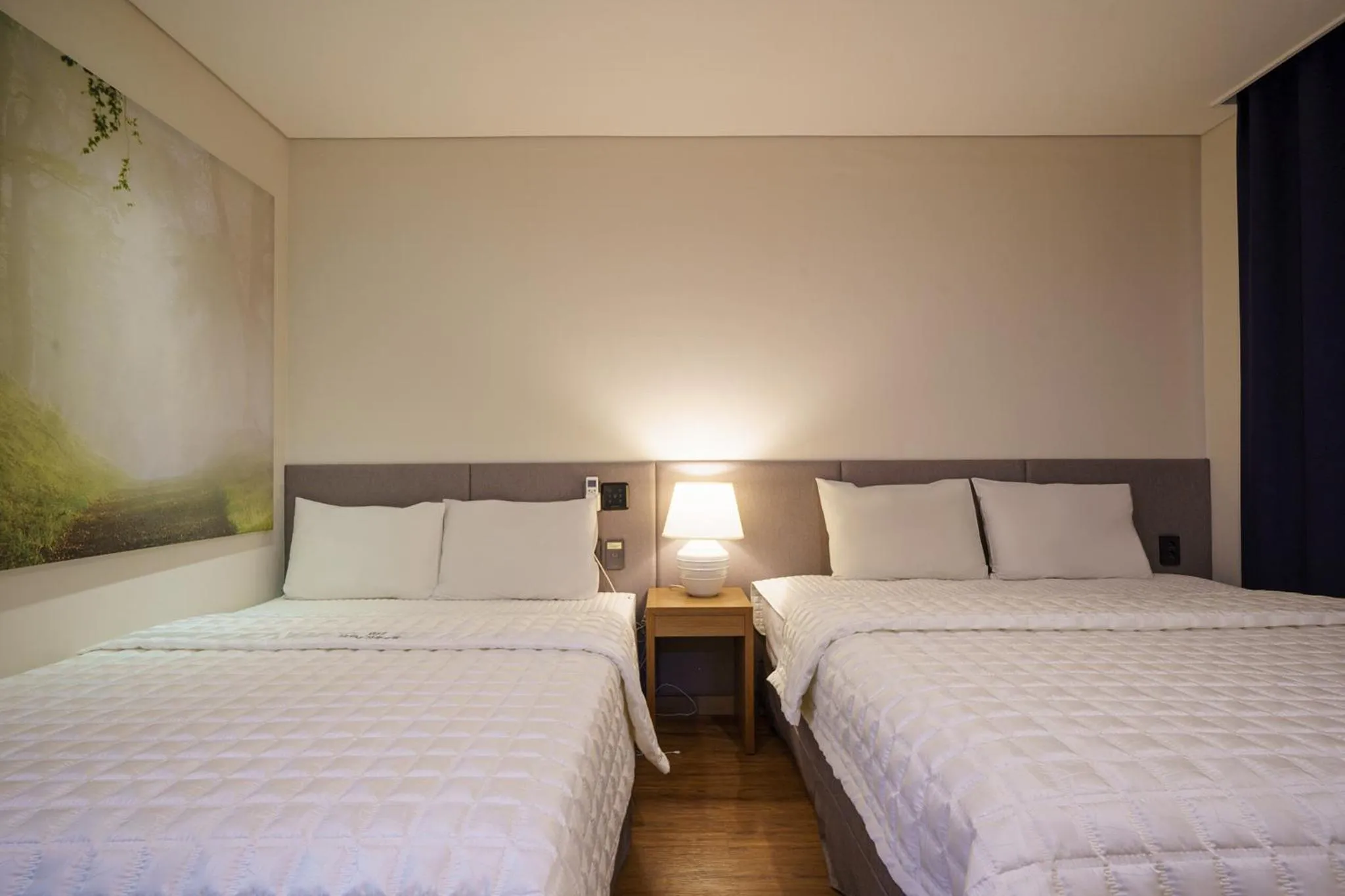 Bed in MTM Family Hotel