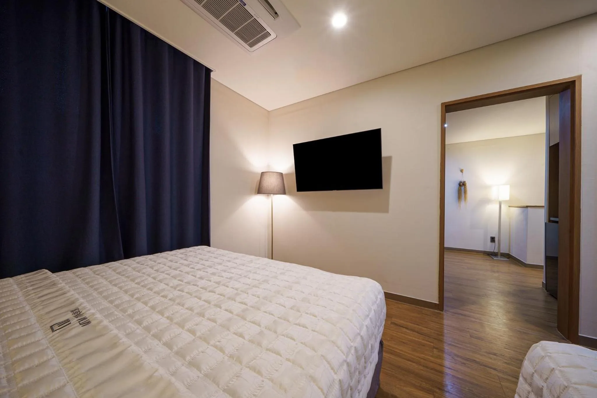 Bed in MTM Family Hotel