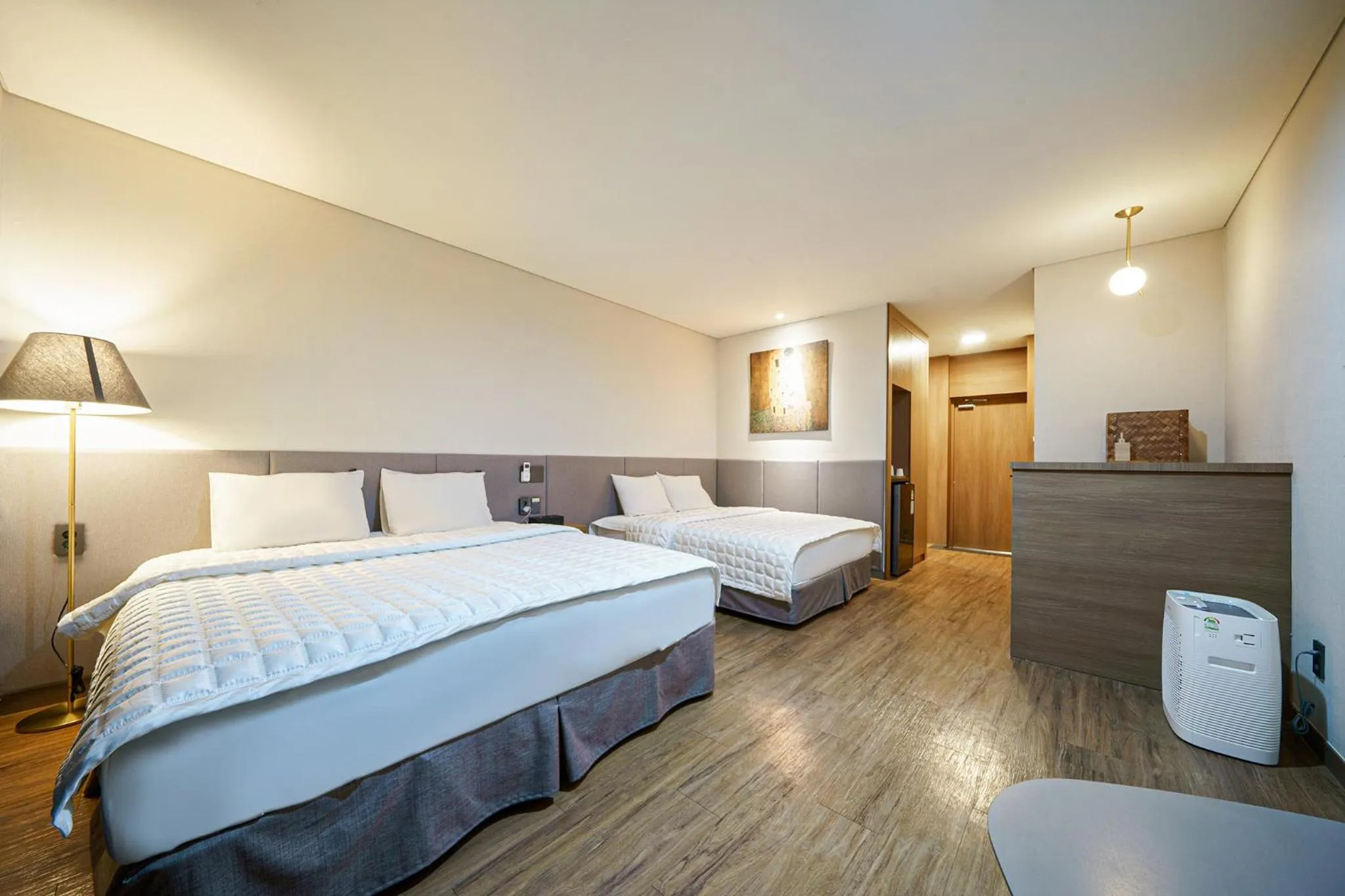 Bed in MTM Family Hotel