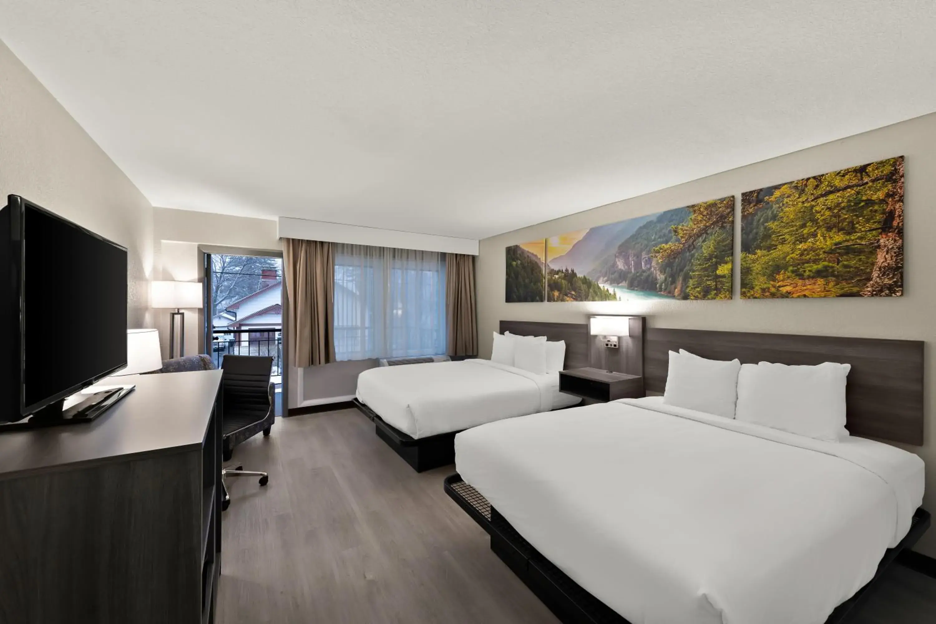 Queen Room with Two Queen Beds and Balcony - Non-Smoking in Clarion Pointe Rhinelander Downtown Queen Room with Two Queen Beds and Balcony - Non-Smoking in Clarion Pointe Rhinelander Downtown