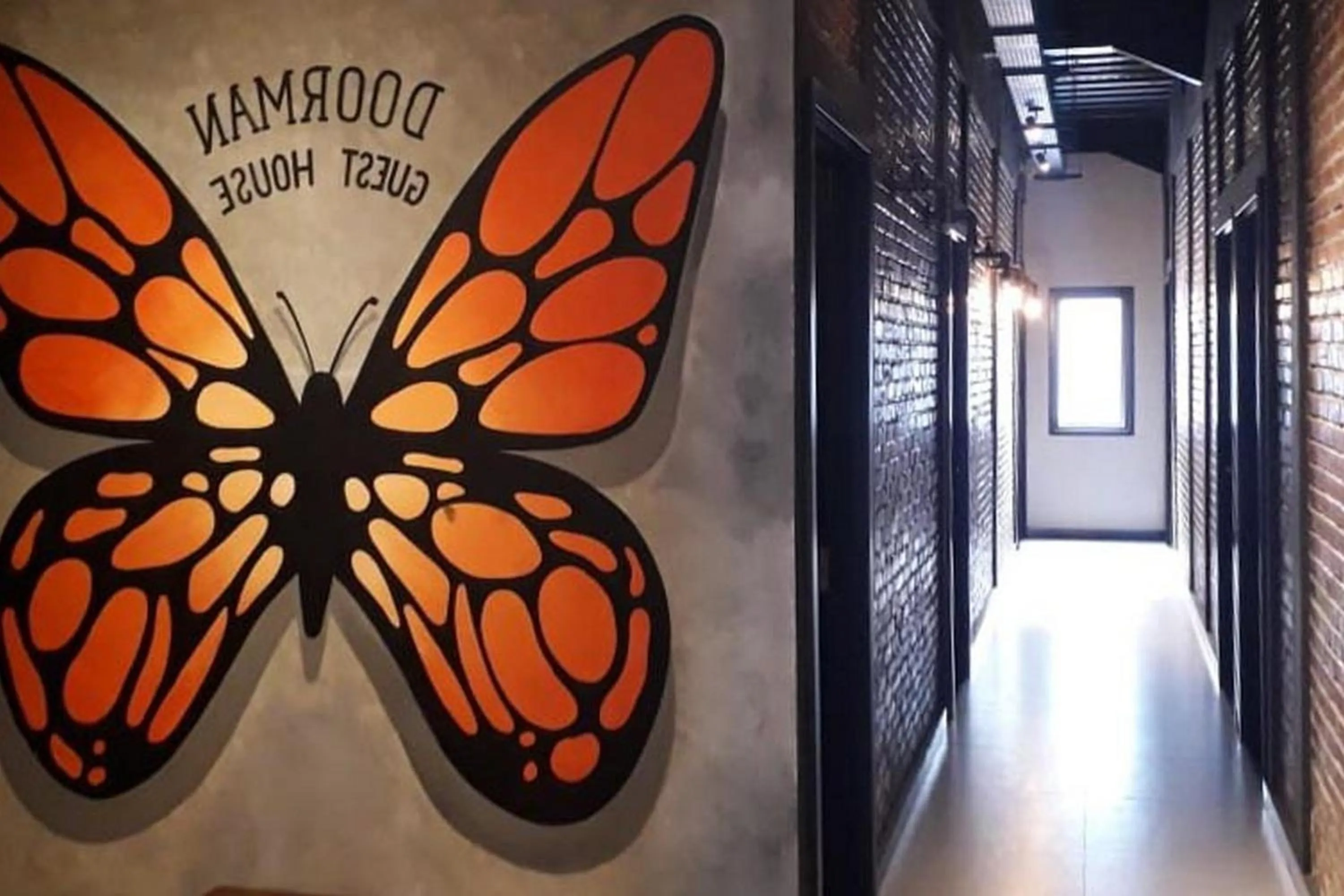 Property logo or sign in RedDoorz Plus @ Doorman Guest House