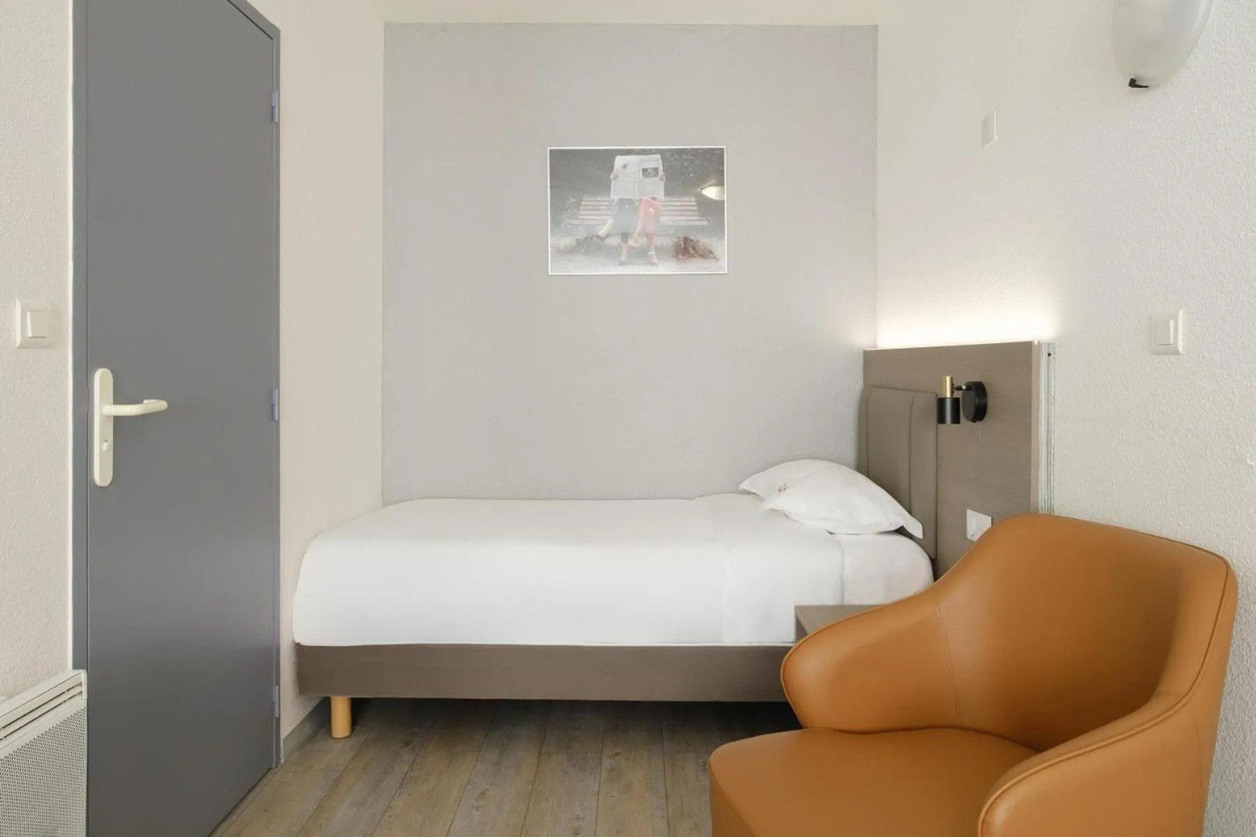 Bed in Hotel Tambourin