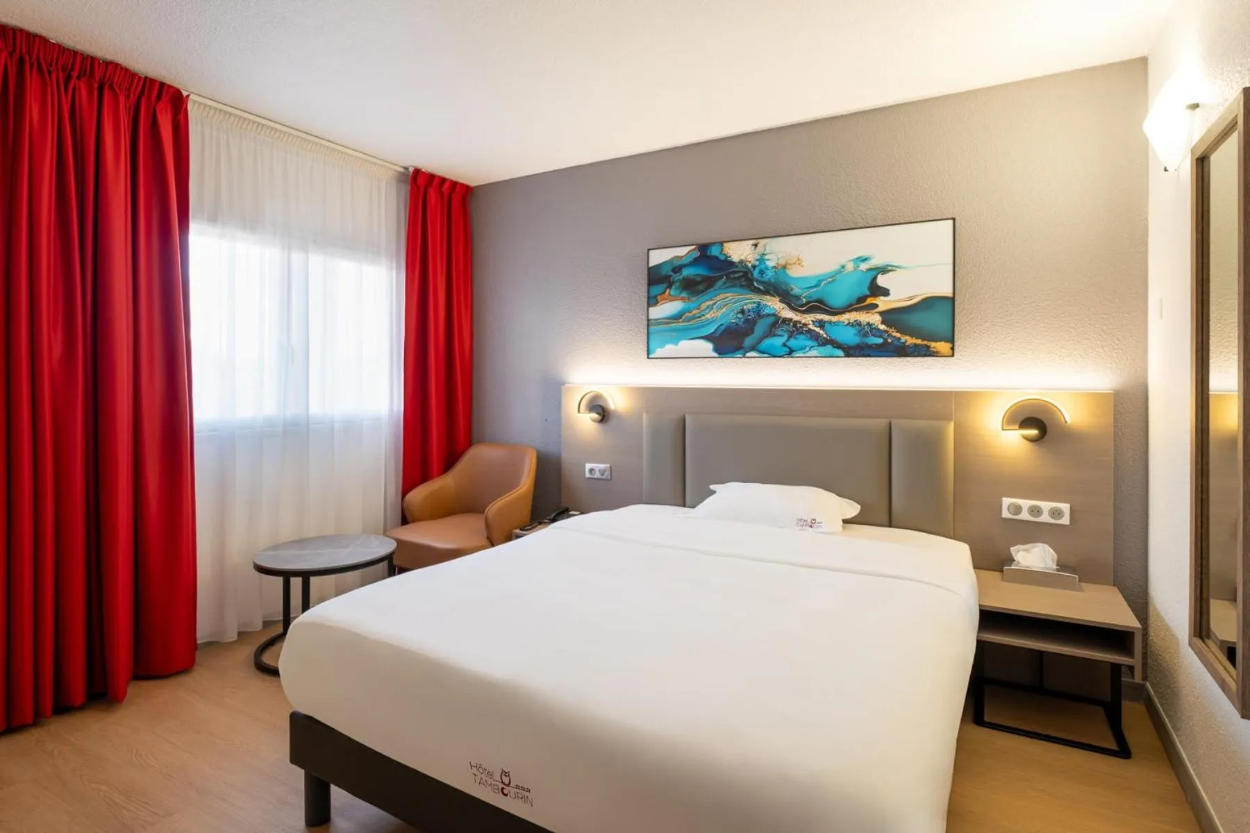 Bed in Hotel Tambourin