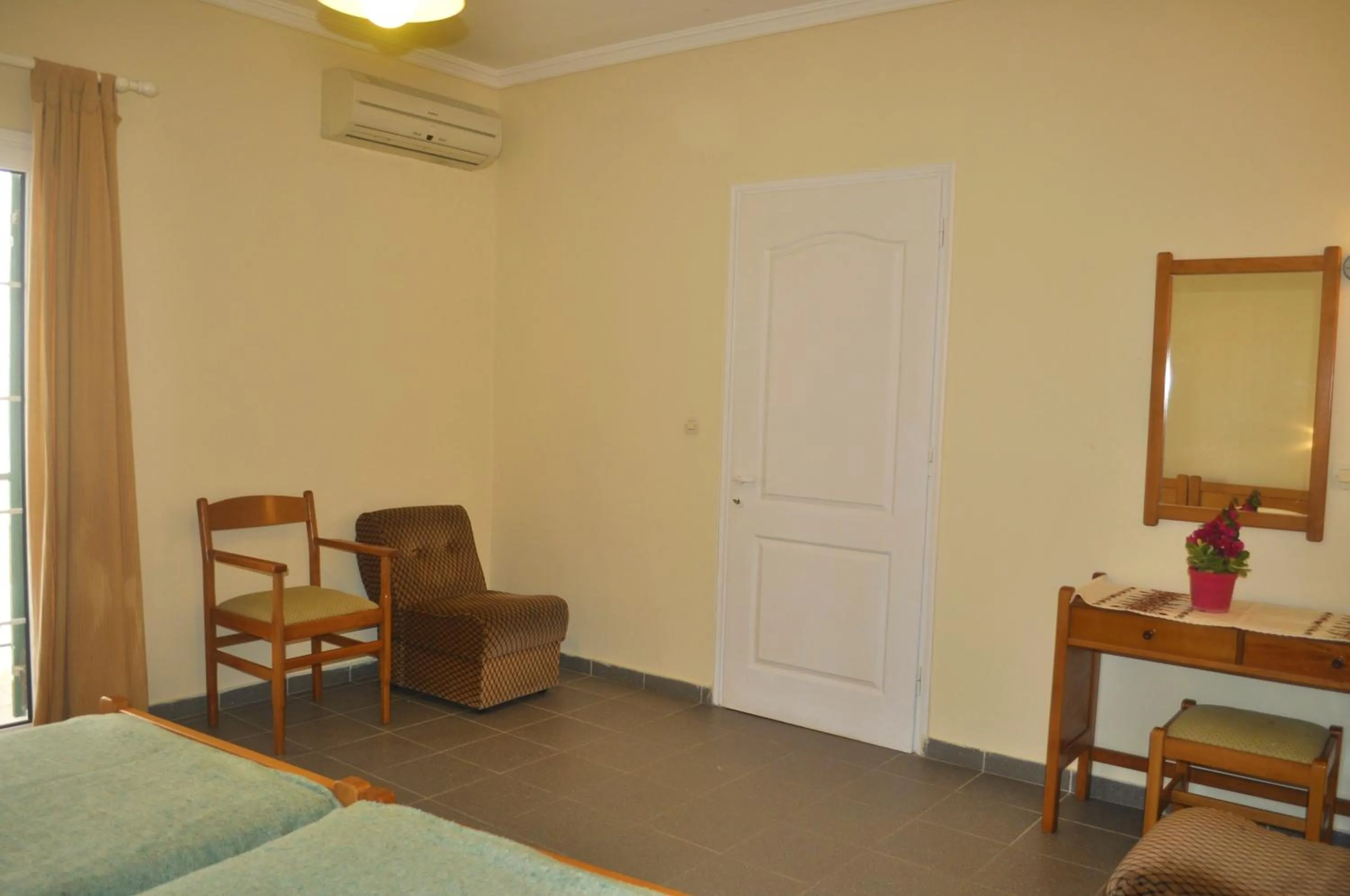 Bedroom, Bed in Holiday Apartments yannis on Agios Gordios beach in Corfu