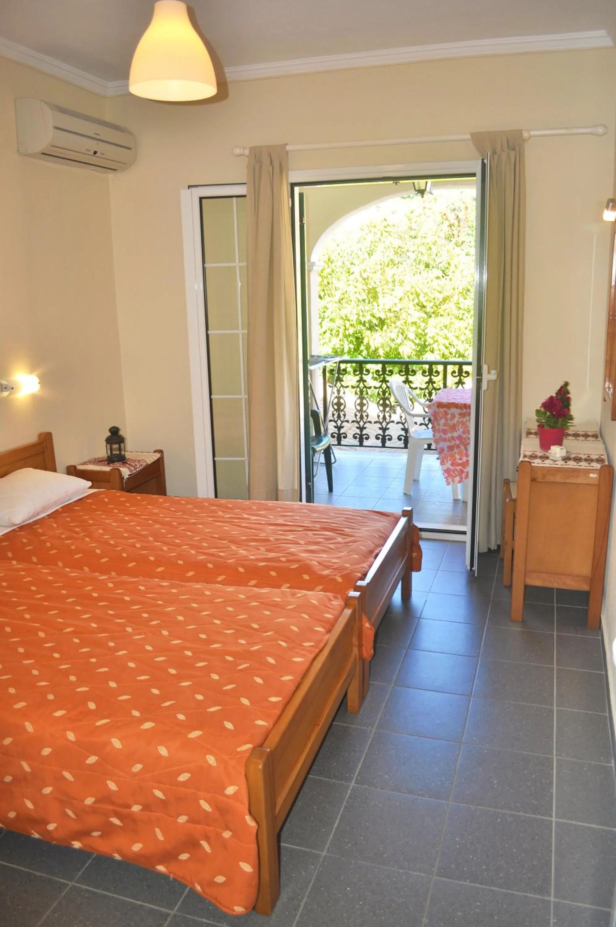 Bedroom, Bed in Holiday Apartments yannis on Agios Gordios beach in Corfu