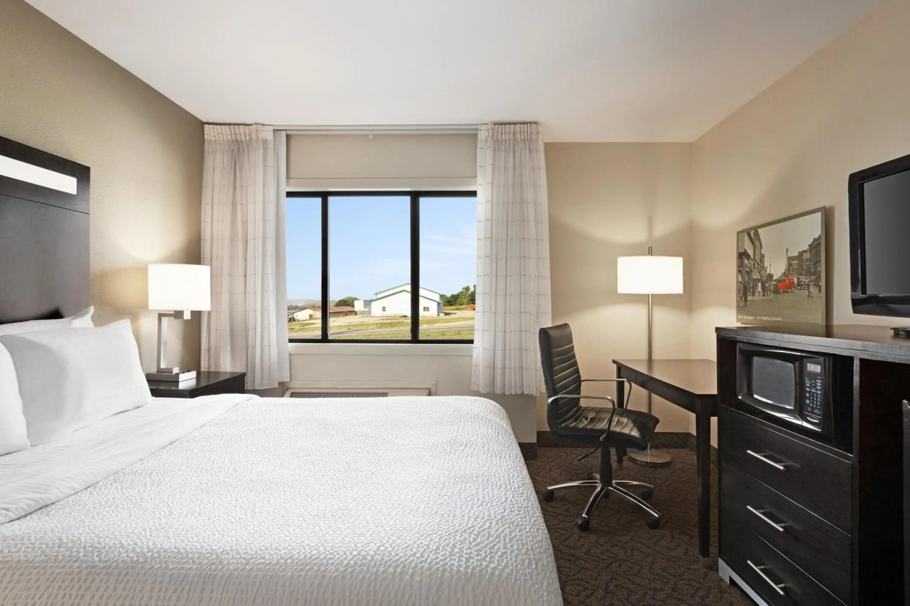 Bed in Carrollton Hotel