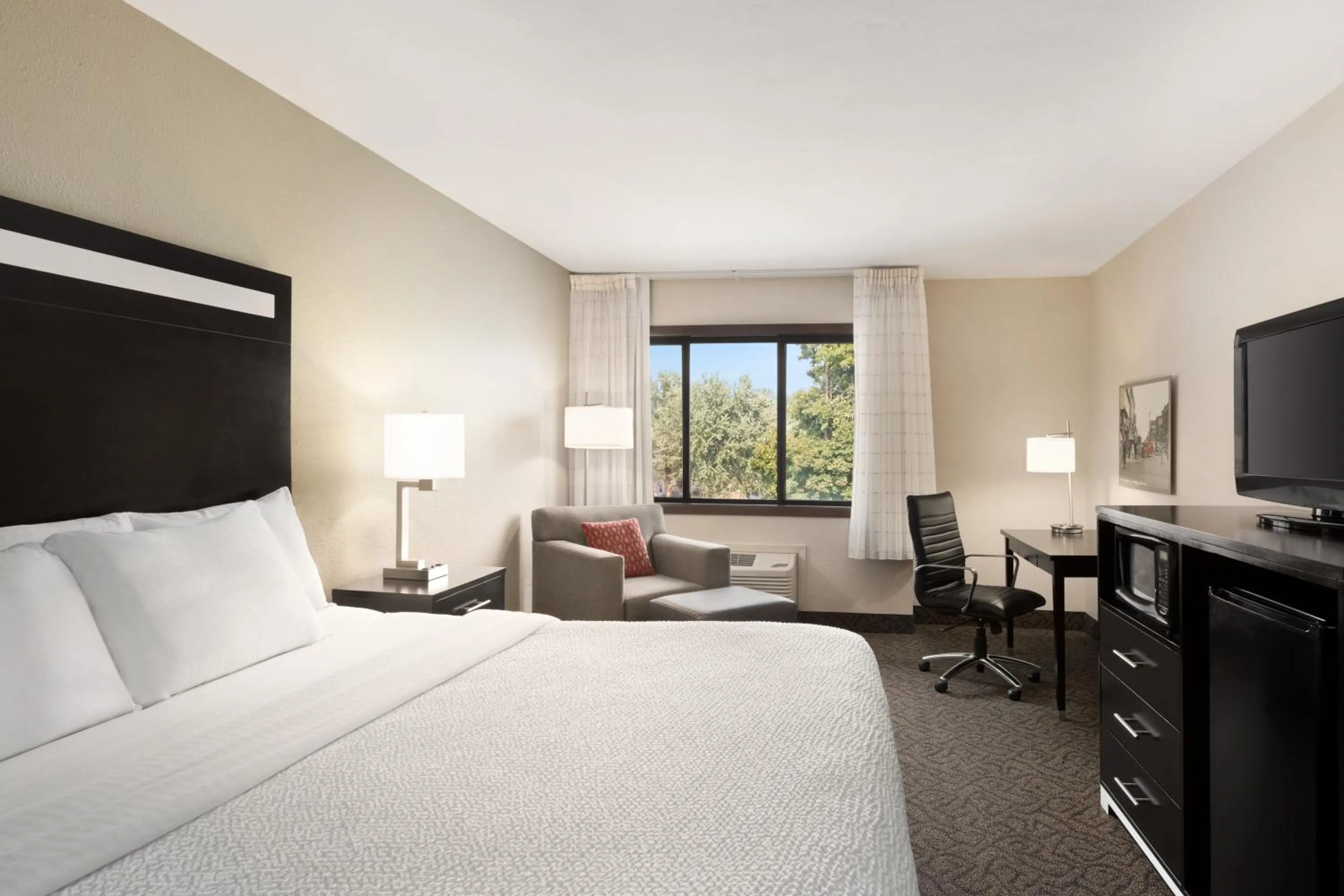 Bed in Carrollton Hotel