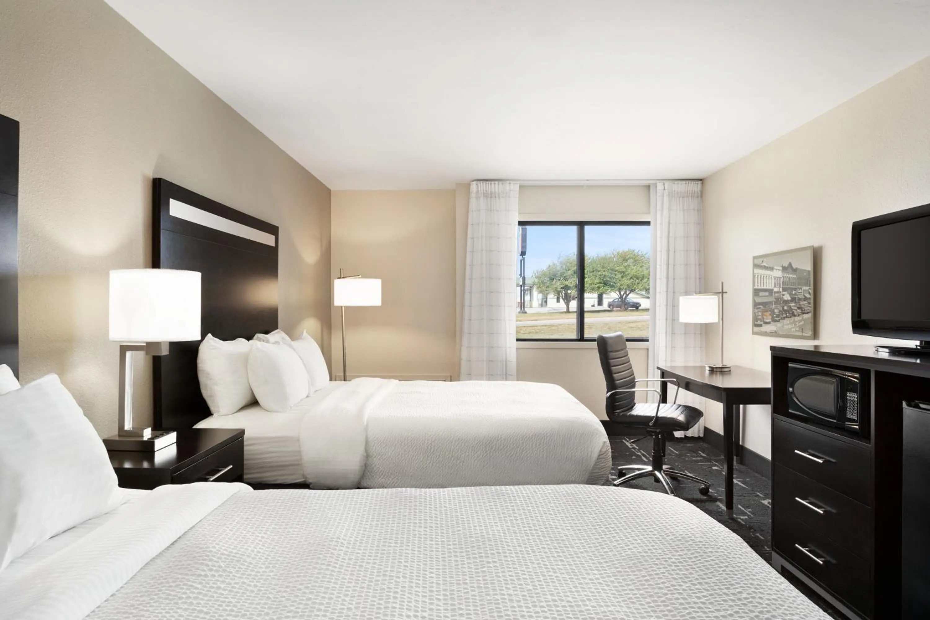 Bed in Carrollton Hotel