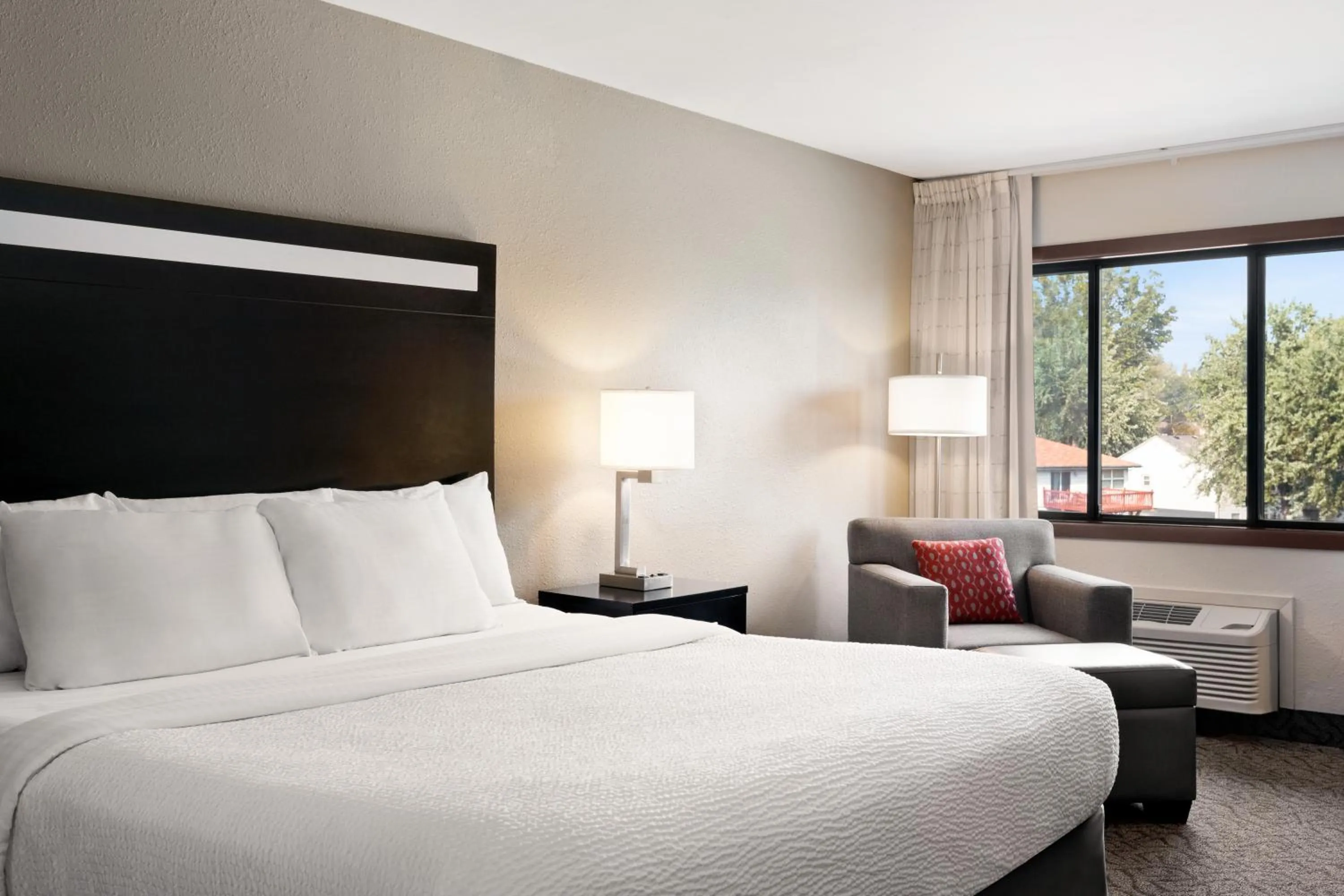 Bed in Carrollton Hotel