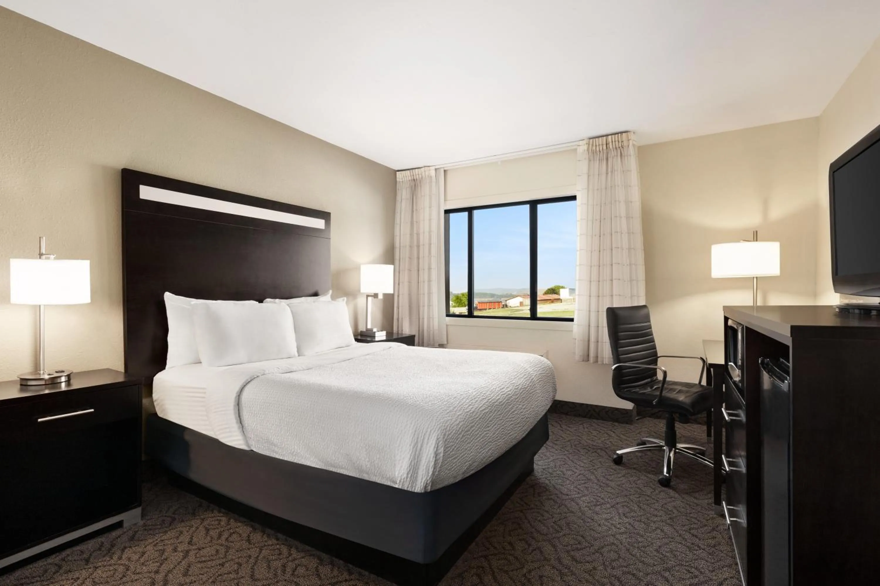 Bed in Carrollton Hotel