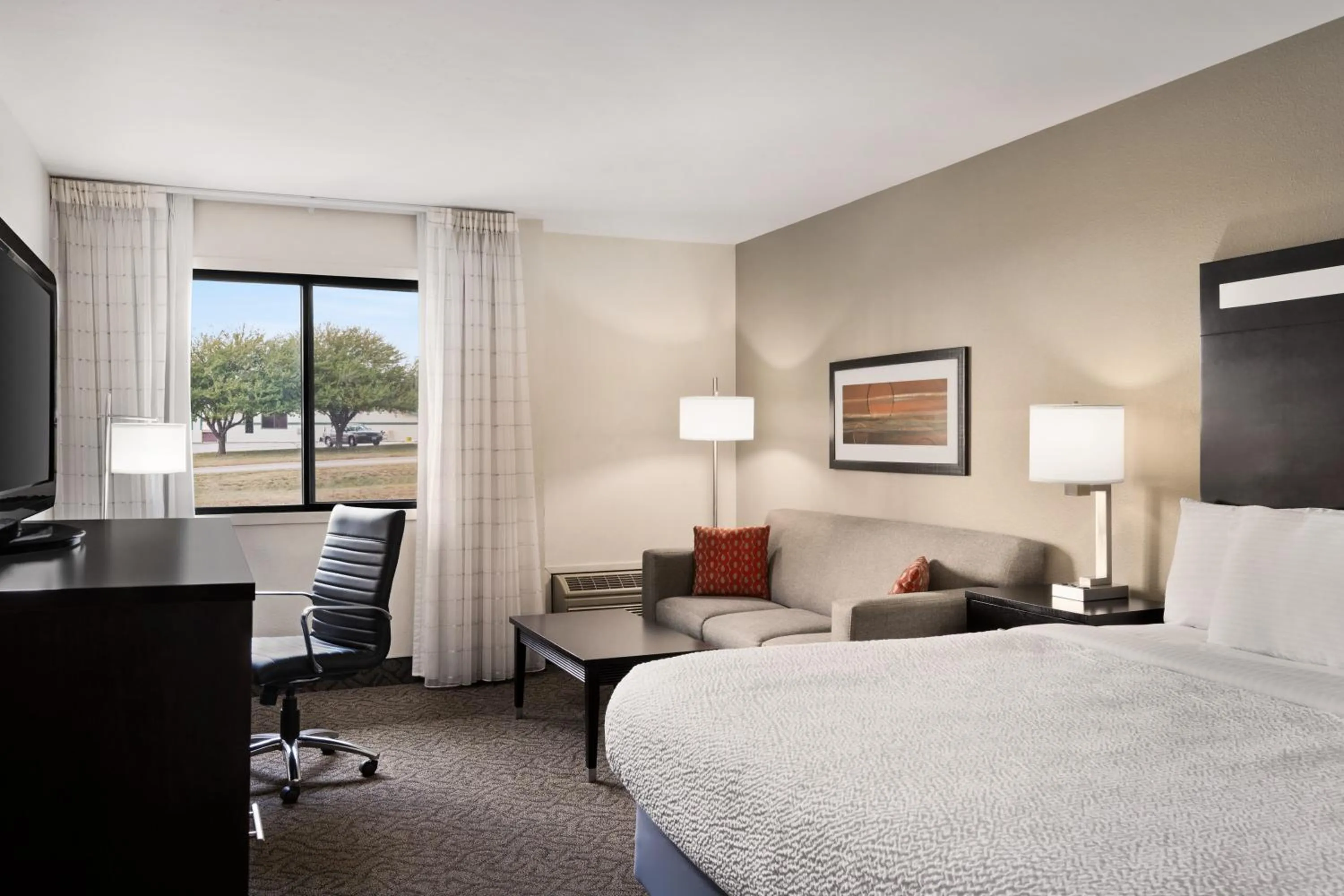 Bed in Carrollton Hotel