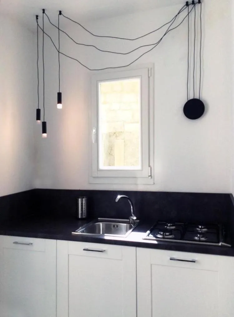 Kitchen or kitchenette in Isabella di Castiglia Apartments