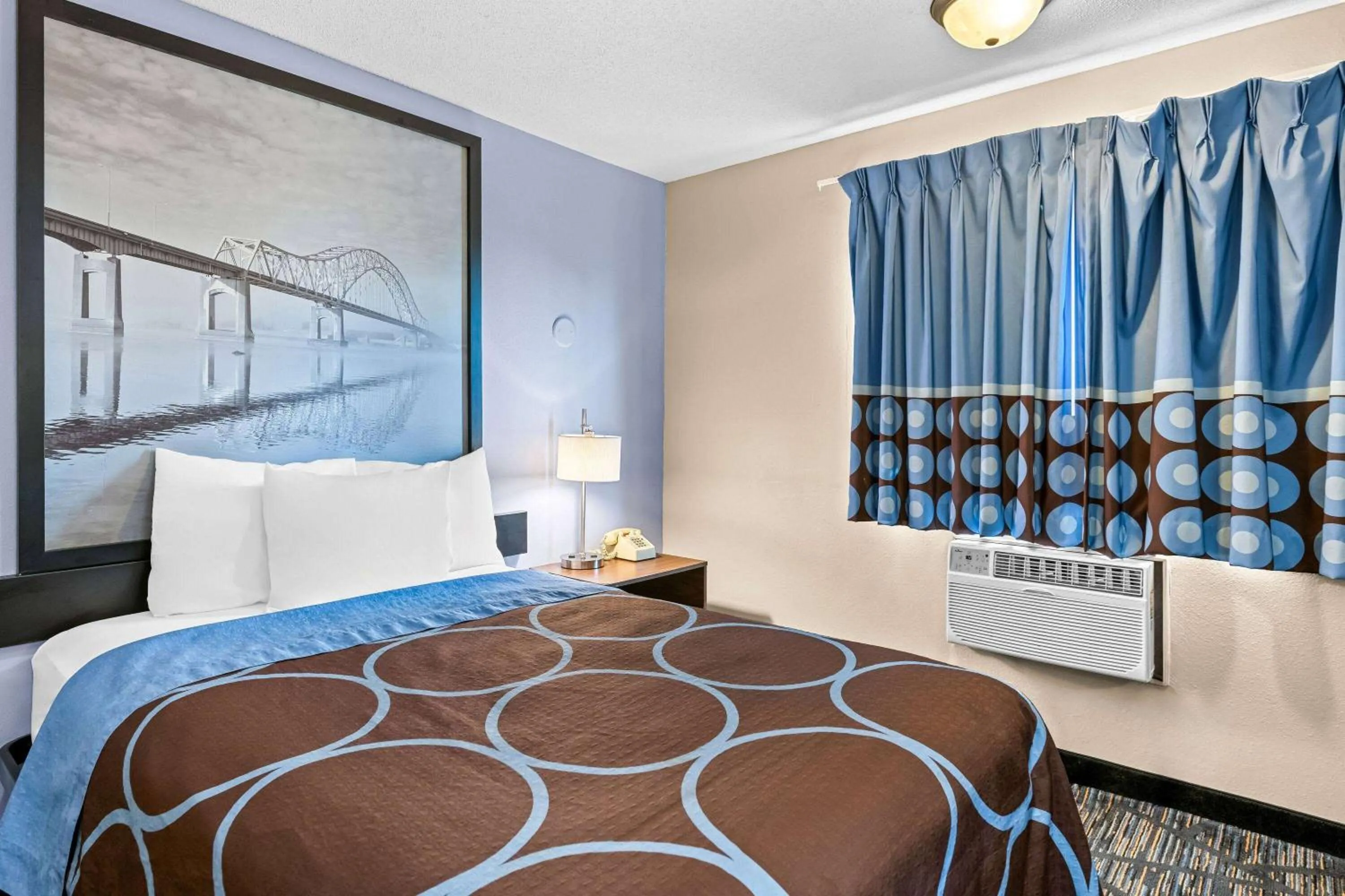 Bed in Super 8 by Wyndham Council Bluffs IA Omaha NE Area