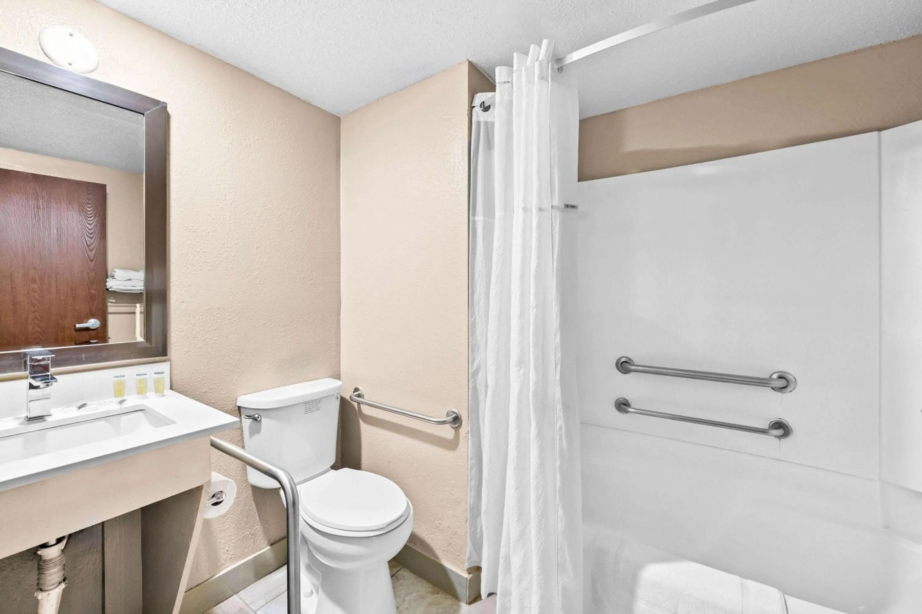 Bathroom in Super 8 by Wyndham Council Bluffs IA Omaha NE Area