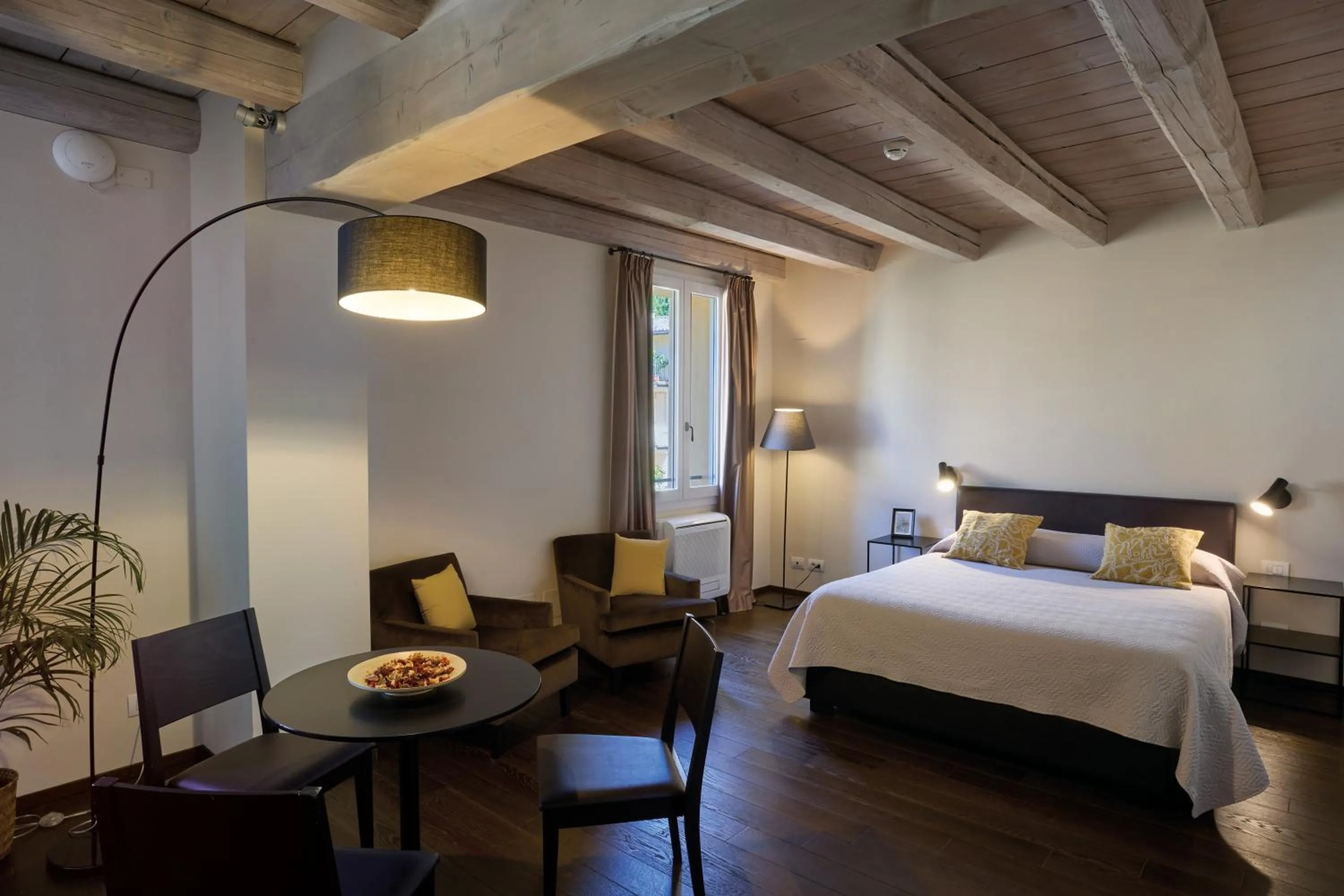 Bed in PALAZZO DE' ROSSI HOTEL