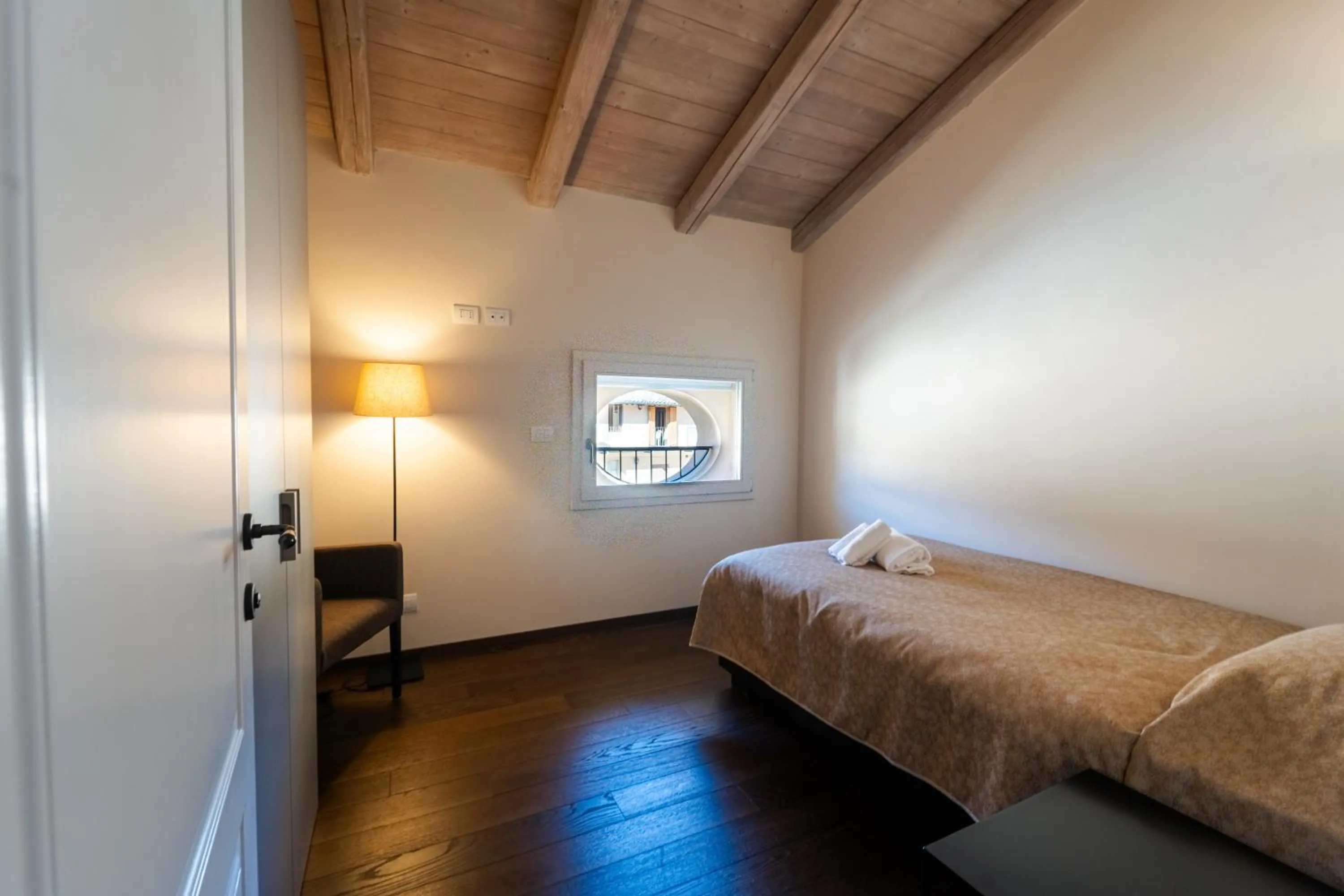 Bed in PALAZZO DE' ROSSI HOTEL