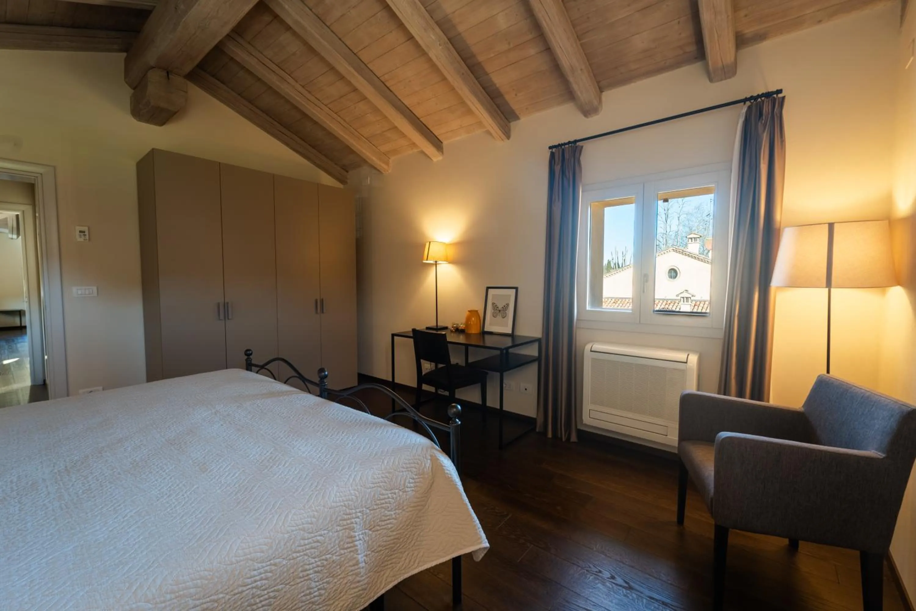 Bed in PALAZZO DE' ROSSI HOTEL