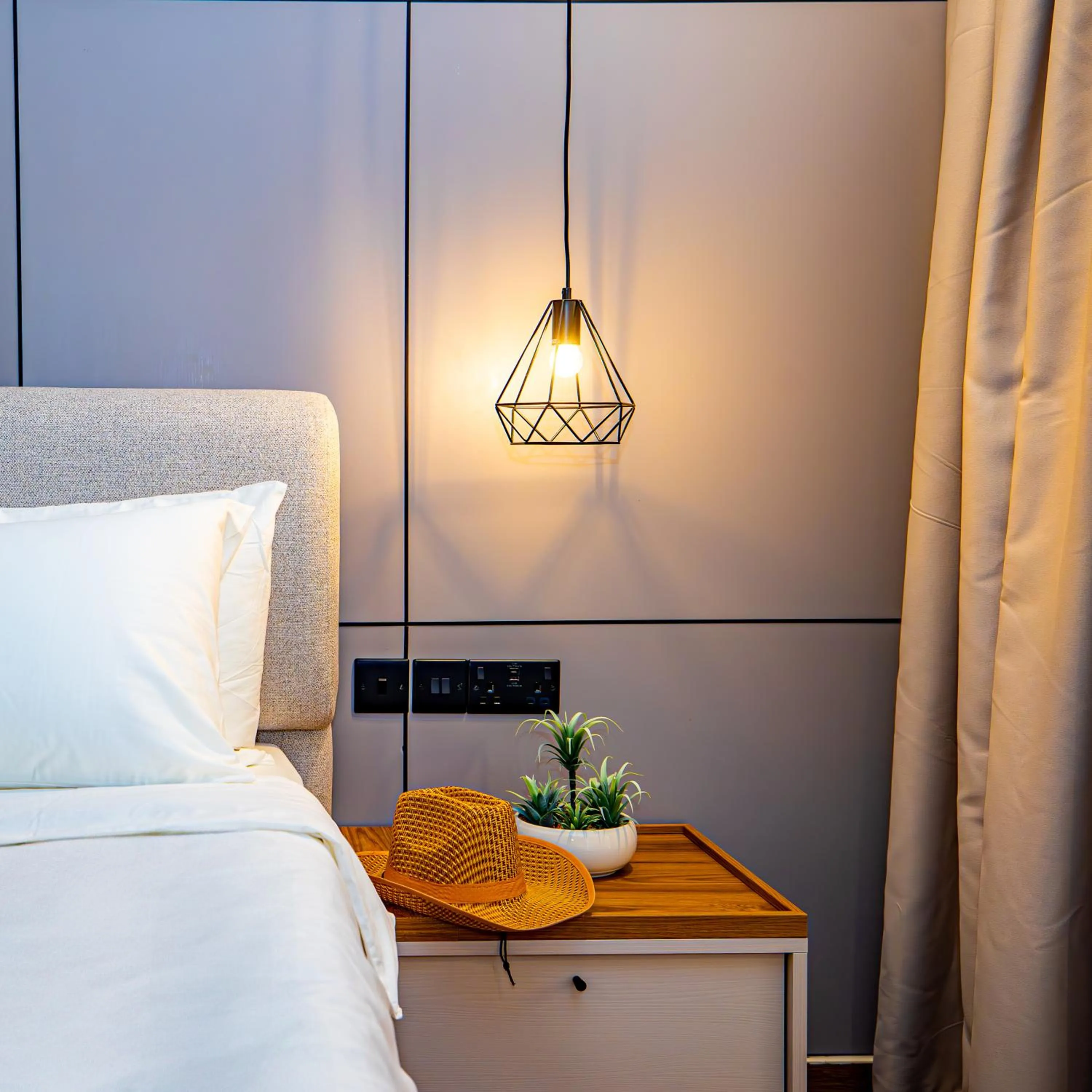 Bed in Sunset Beach Hotel