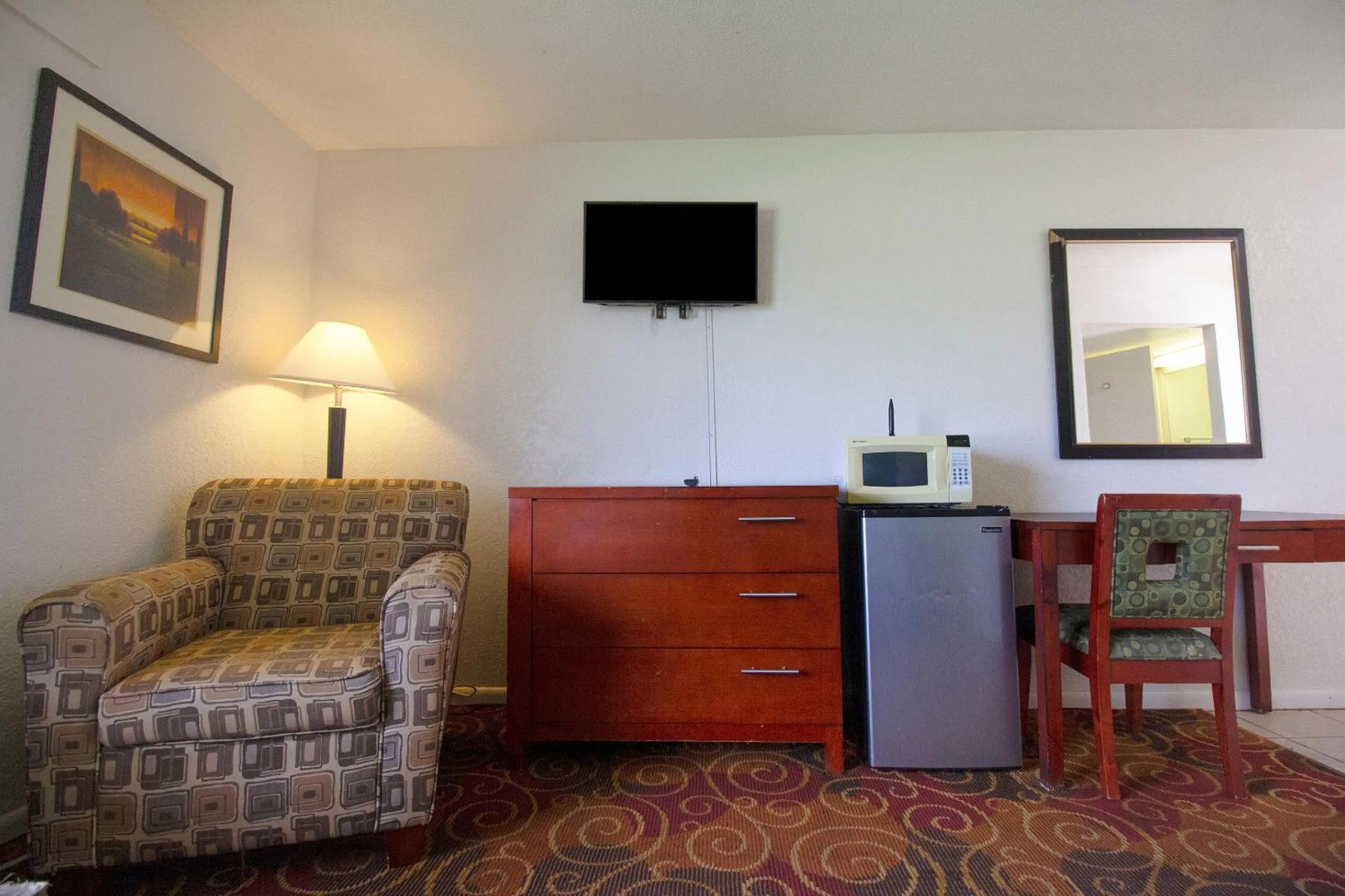 Bedroom in American Best Inn By OYO I-35 Perry near Lake McMurtry