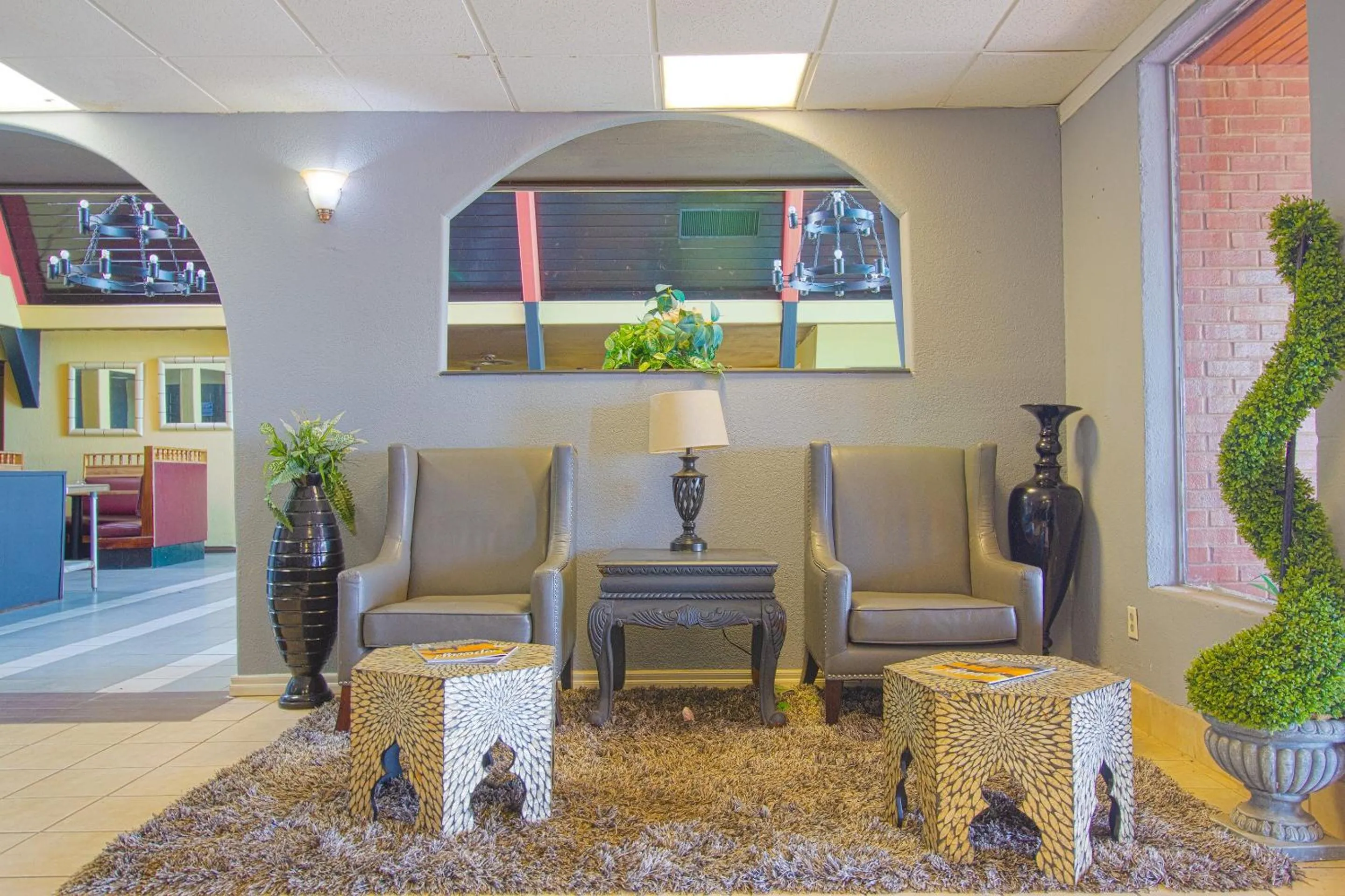 Lobby or reception in American Best Inn By OYO I-35 Perry near Lake McMurtry