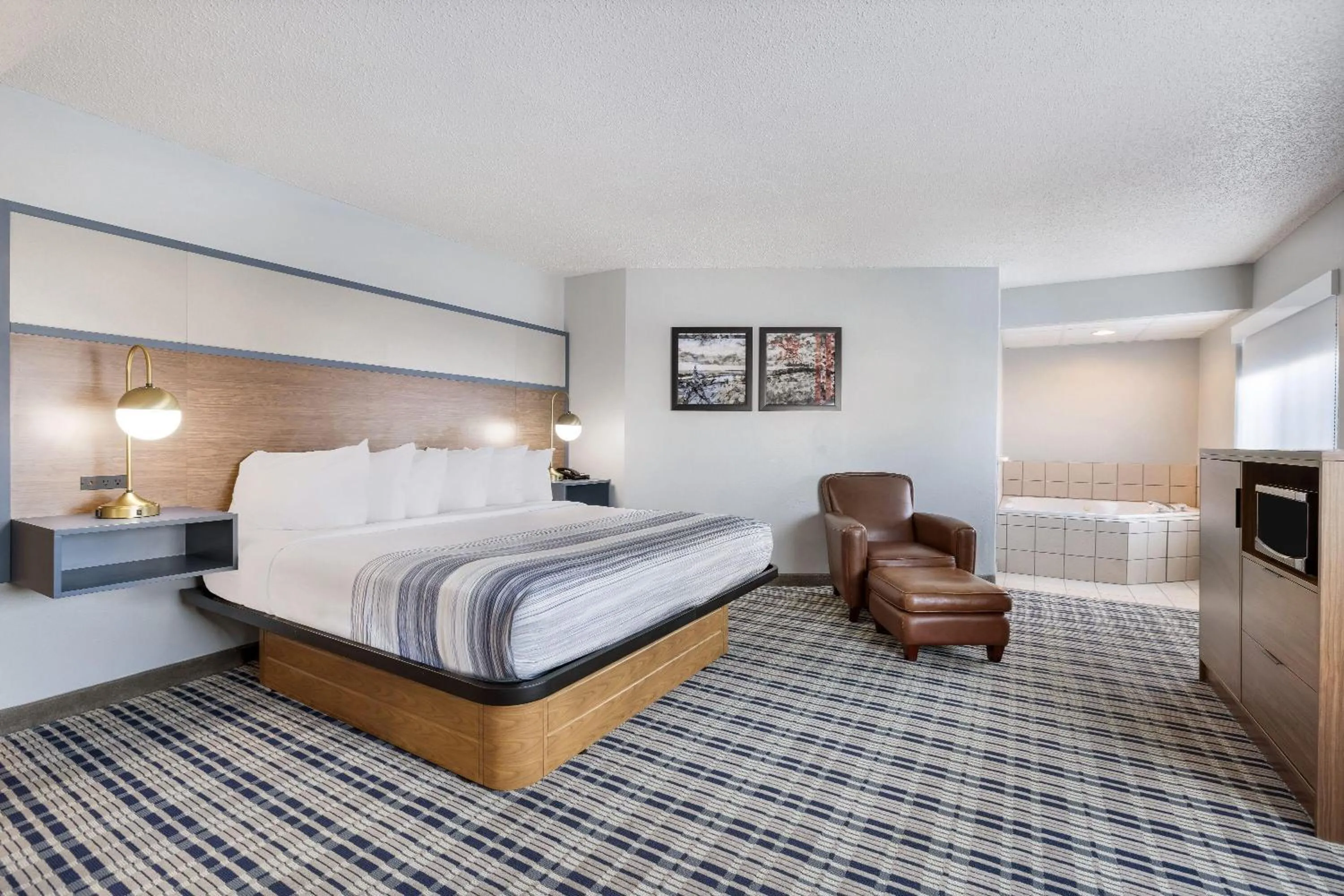 Photo of the whole room, Bed in AmericInn by Wyndham Aberdeen Event Center