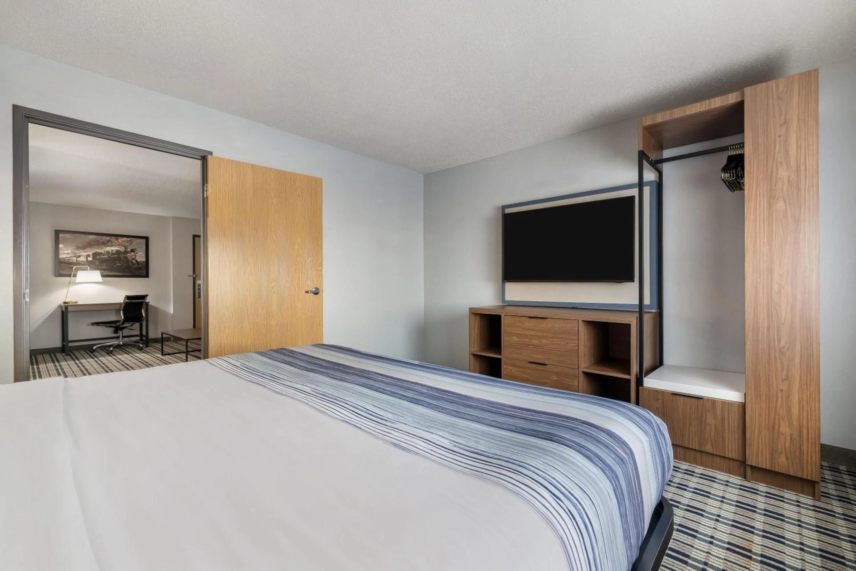 Photo of the whole room, Bed in AmericInn by Wyndham Aberdeen Event Center