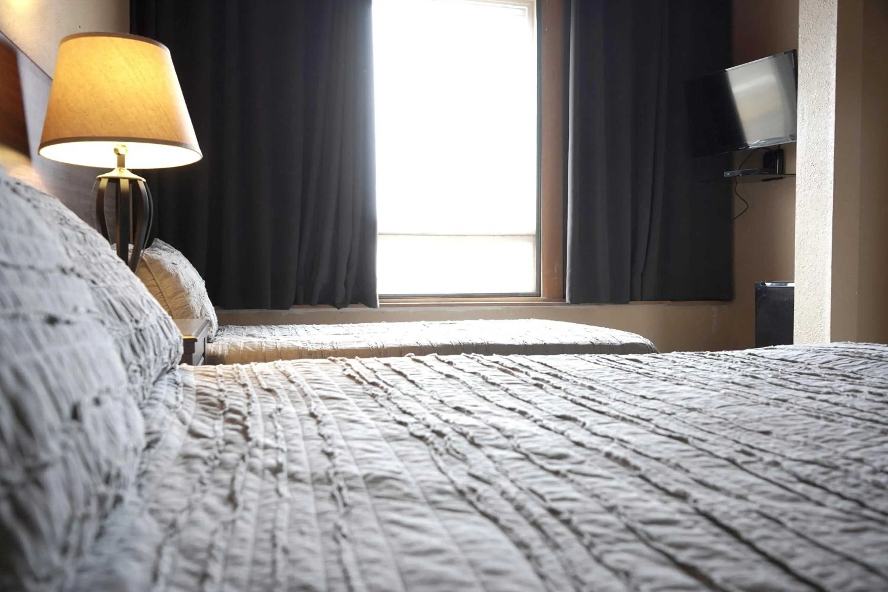 Bed in Old School Motel RV