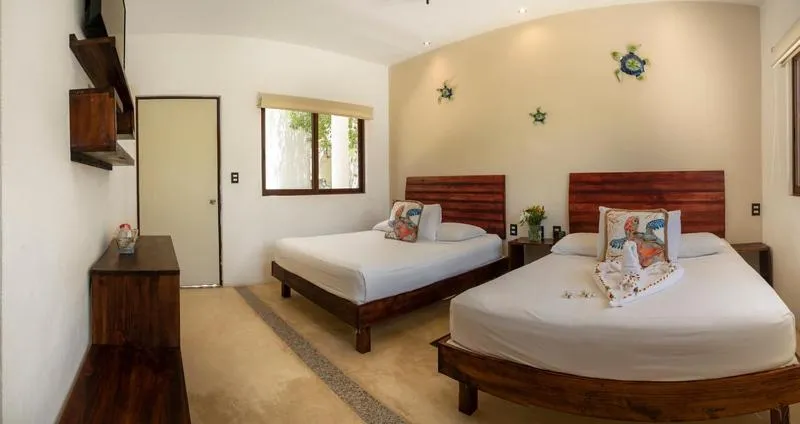 Bed in Villas Palmar Holbox