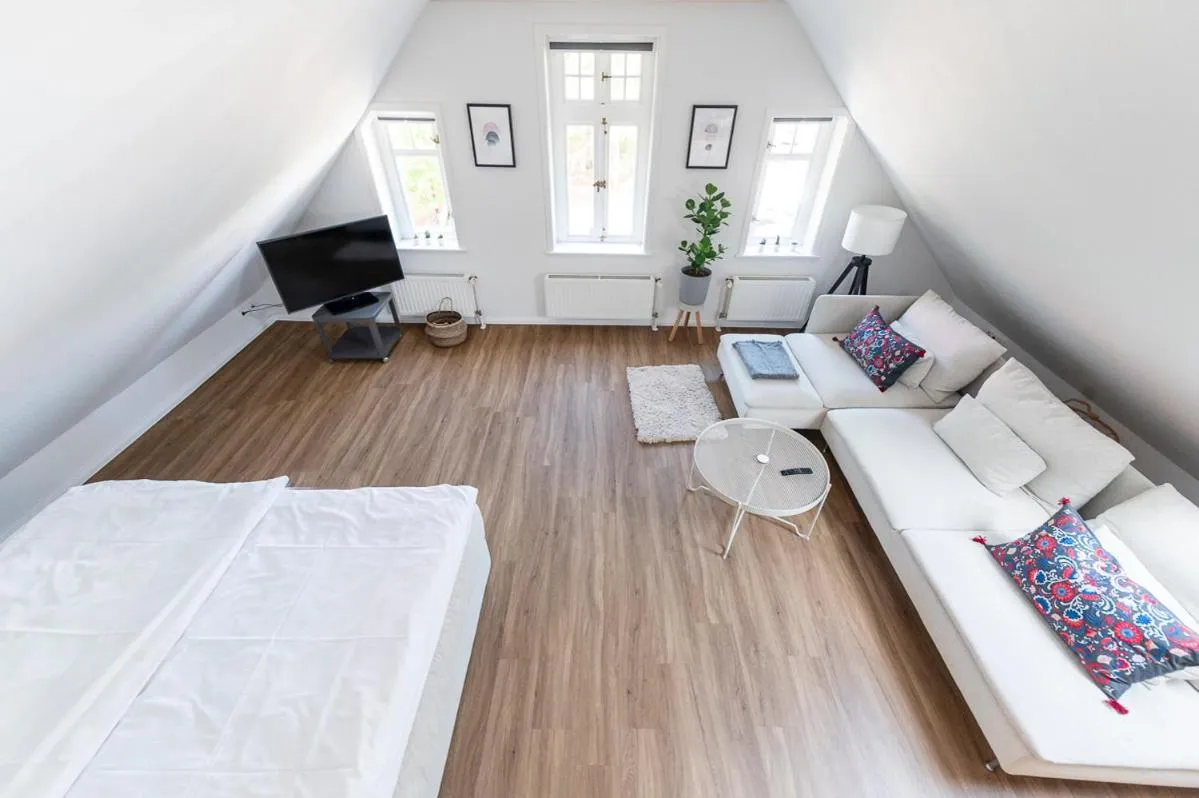 Living room, Bed in Altstadt Apartments Verden