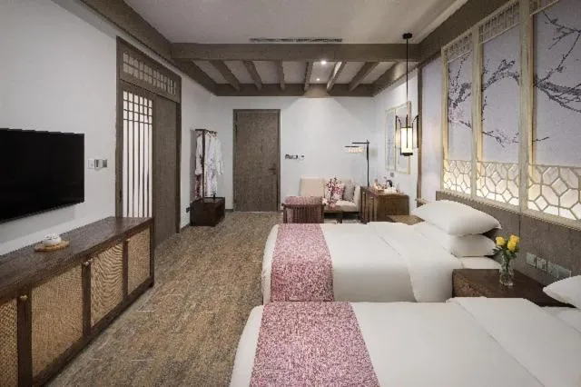Bed in Blossom Hill Yuejingzhuang Hotel