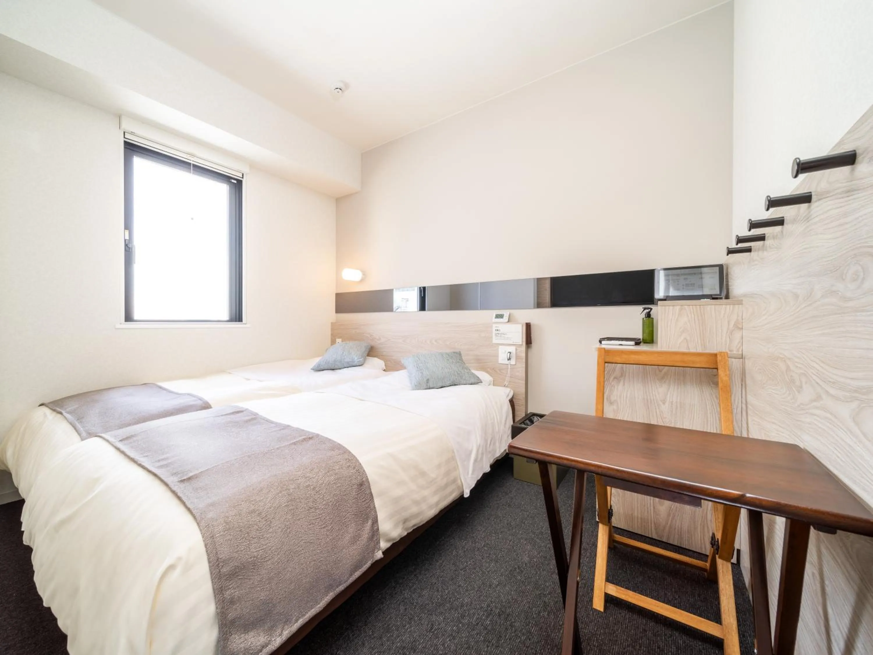 Bed in Super Hotel Premier Akihabara