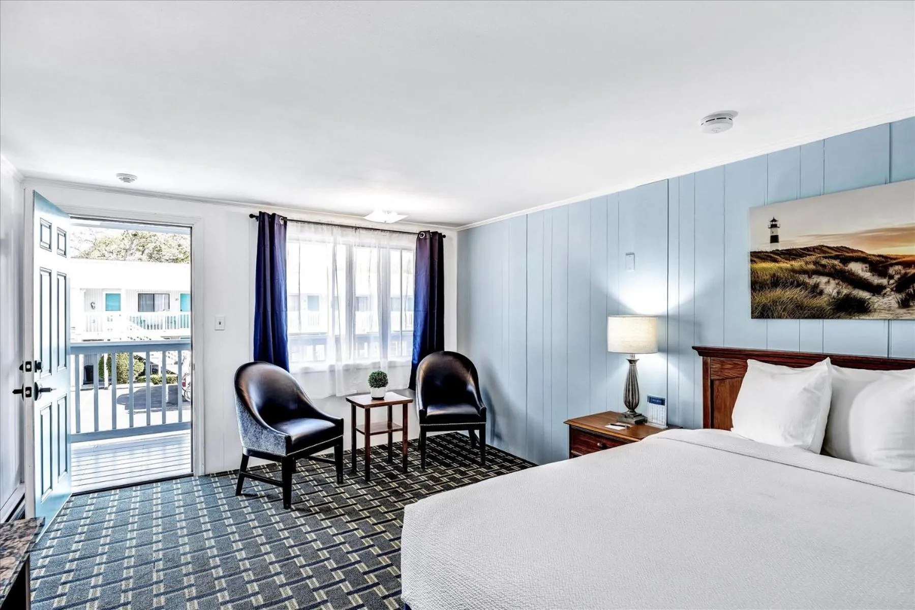 Seating area, Bed in Ocean Breeze Motel