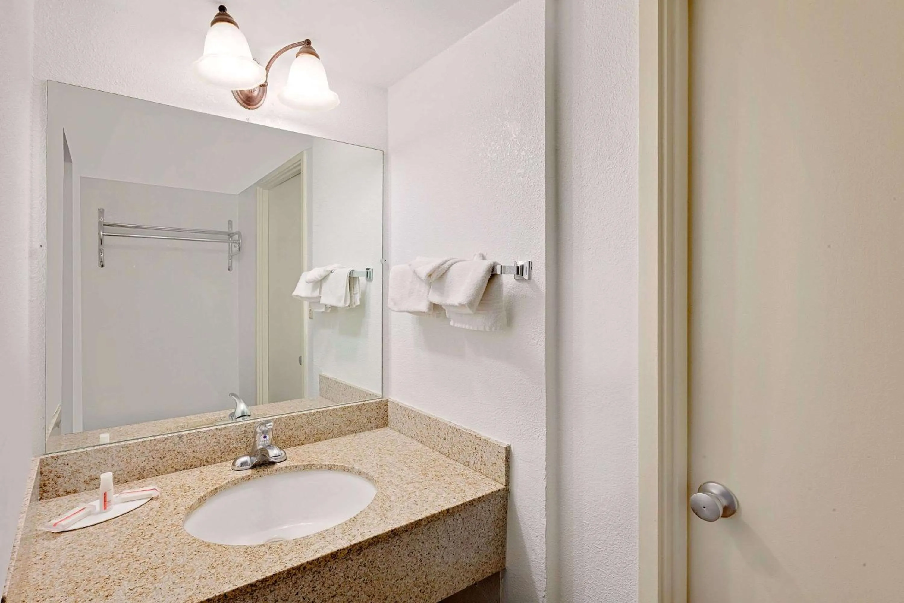 Bathroom in Super 8 by Wyndham Plainview