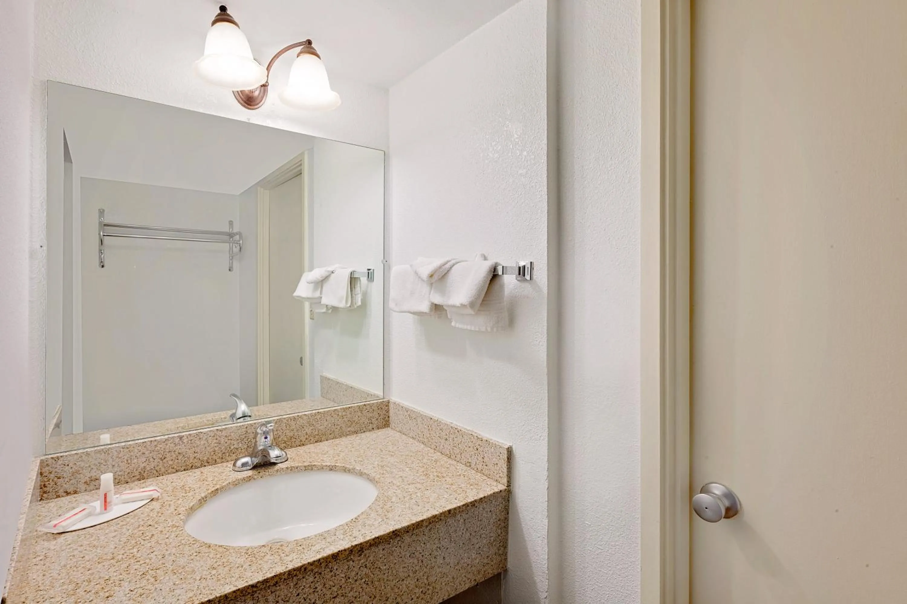 Bathroom in Super 8 by Wyndham Plainview