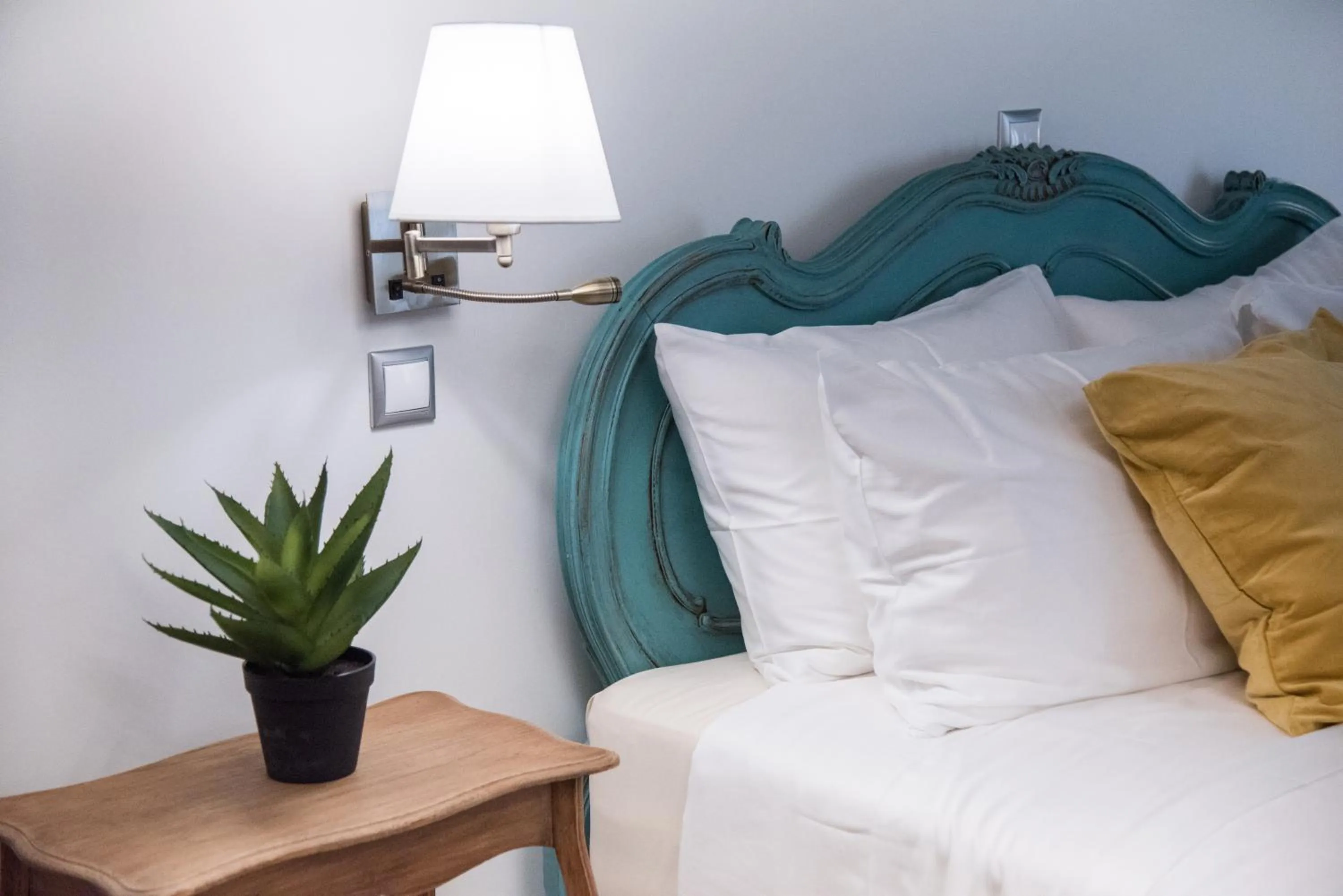 Bed in Rastoni Athens Suites near Acropolis at Tsatsou street