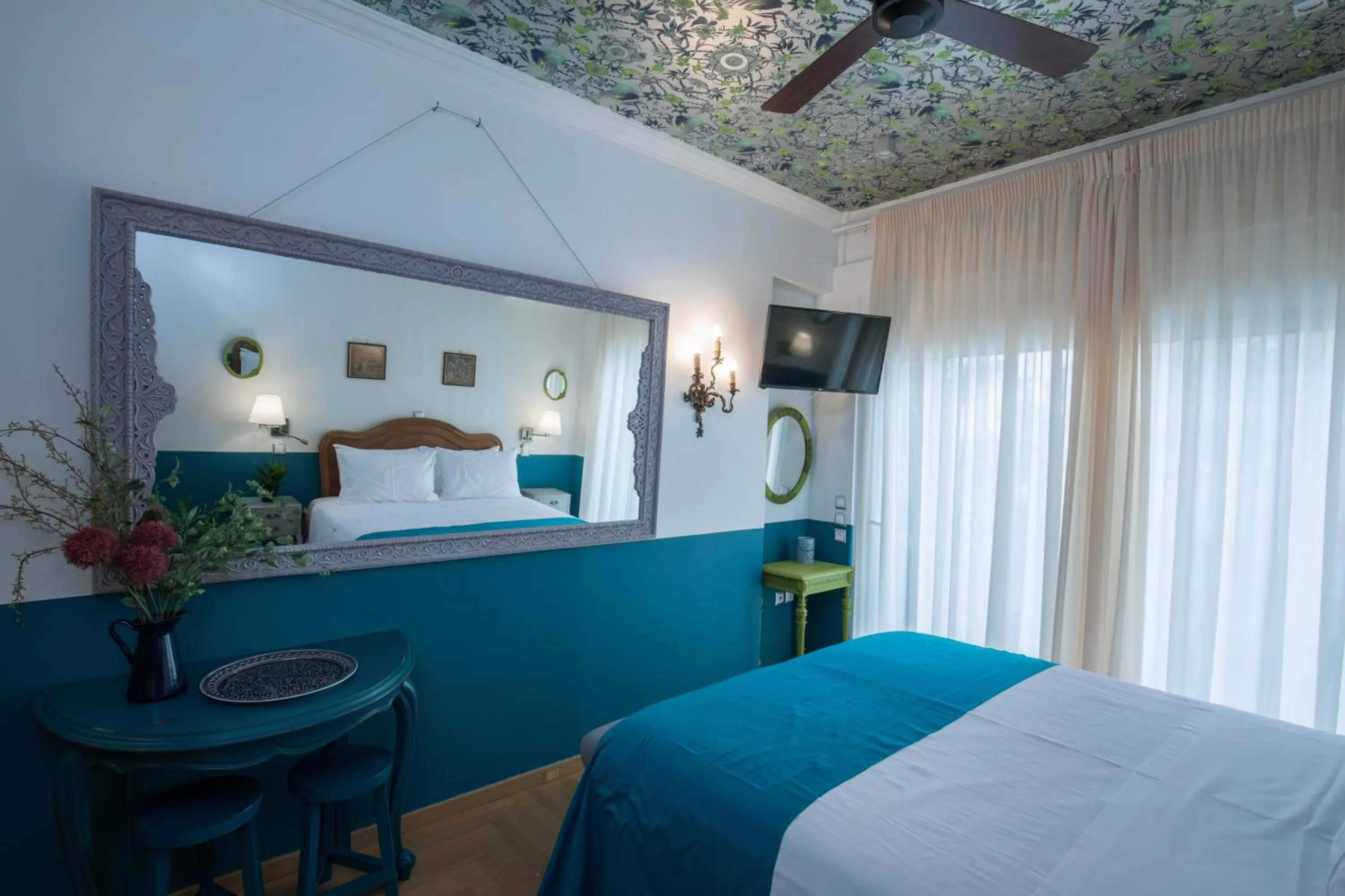 Bed in Rastoni Athens Suites near Acropolis at Tsatsou street