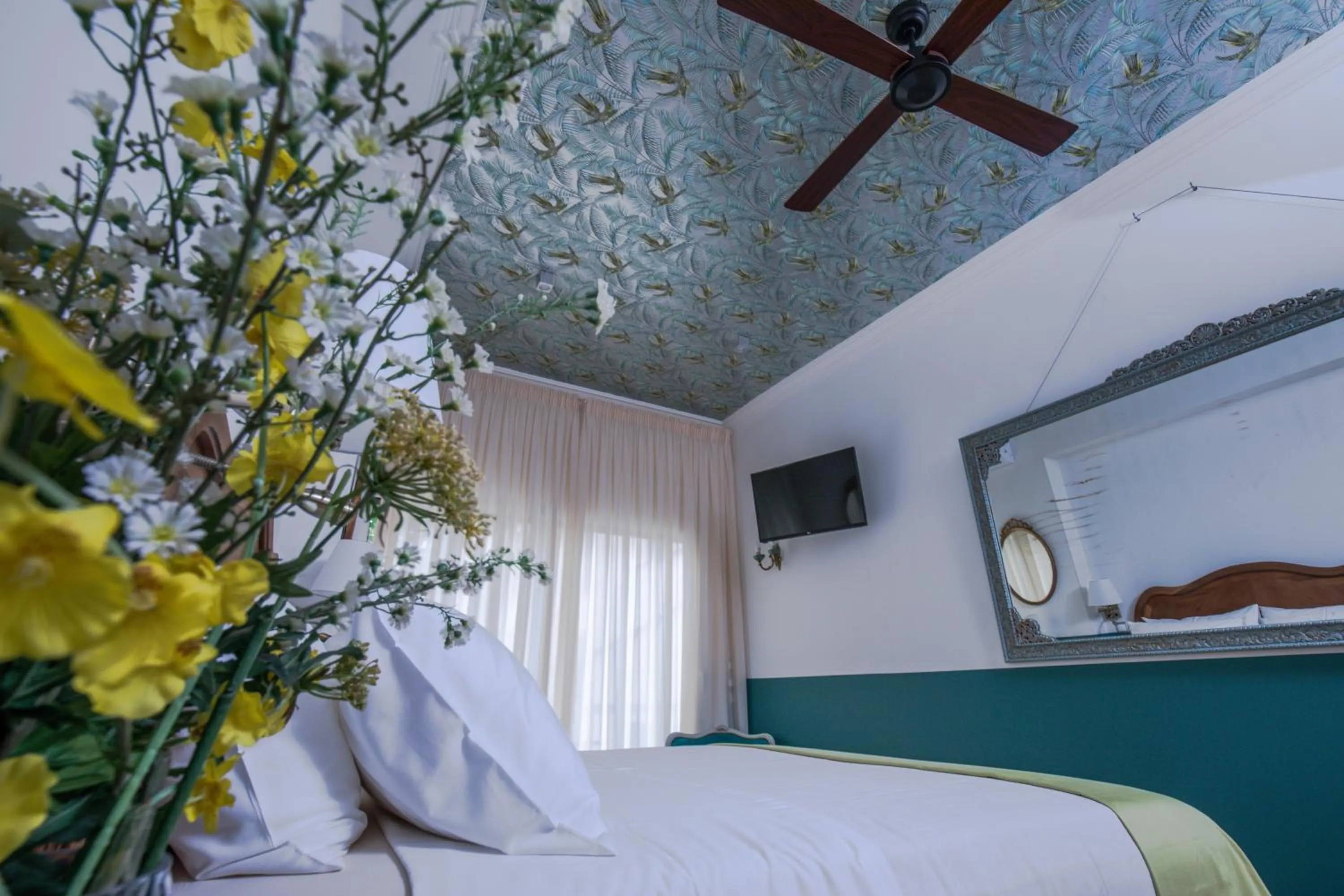 Bed in Rastoni Athens Suites near Acropolis at Tsatsou street