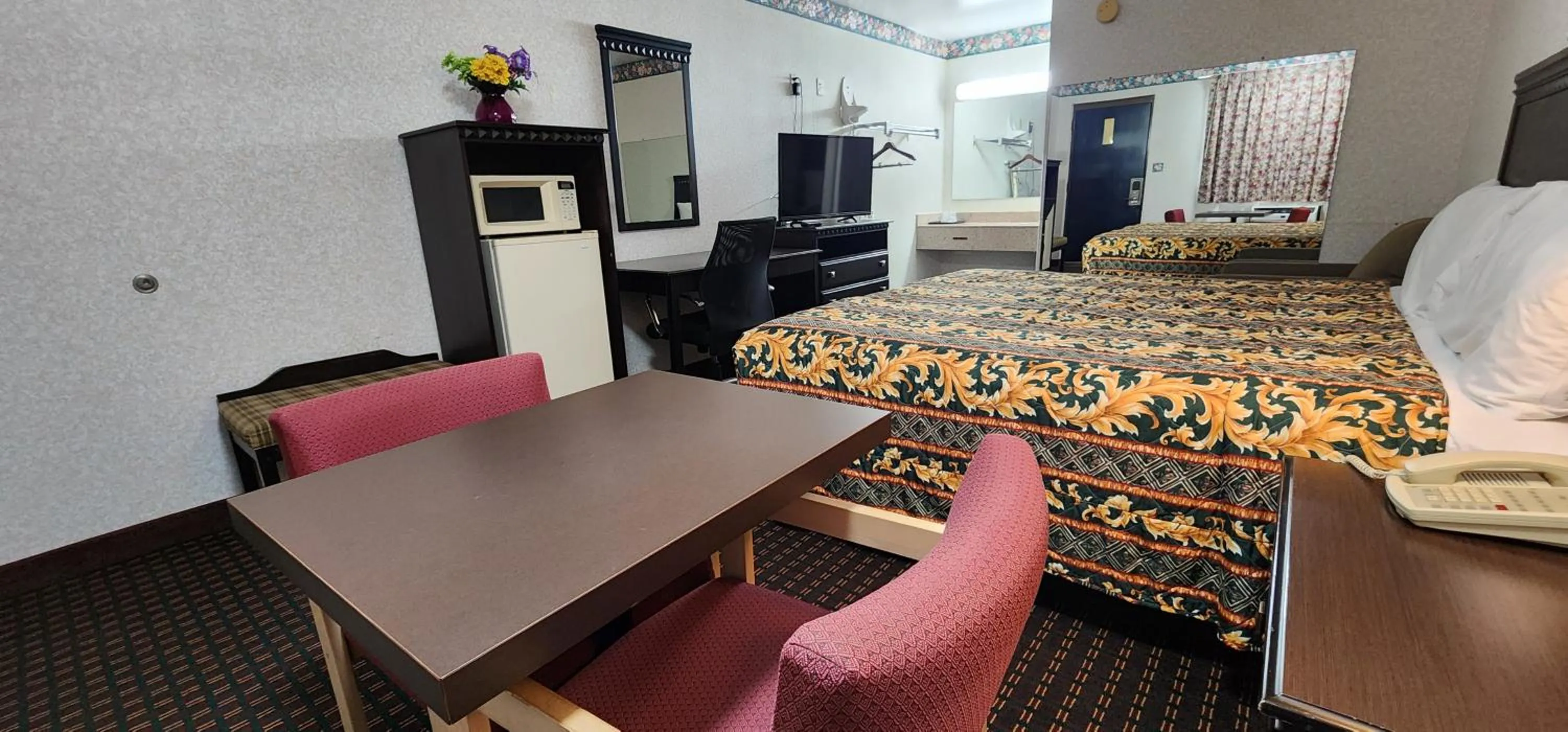 Bedroom, Bed in Turnpike Motel Richmond VA by Hotel O US 60