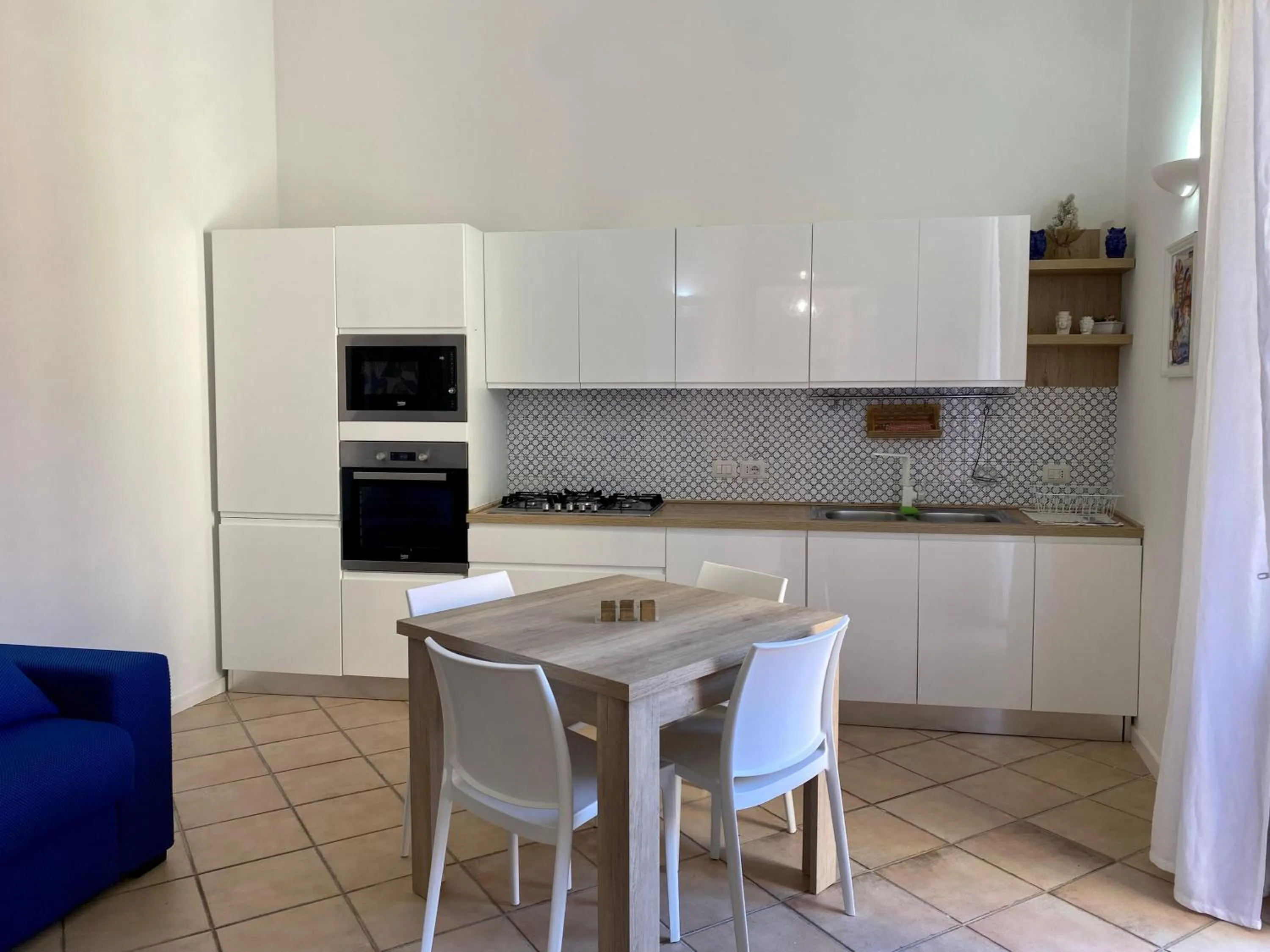 Kitchen or kitchenette in THE PALACE B&B and Apartments