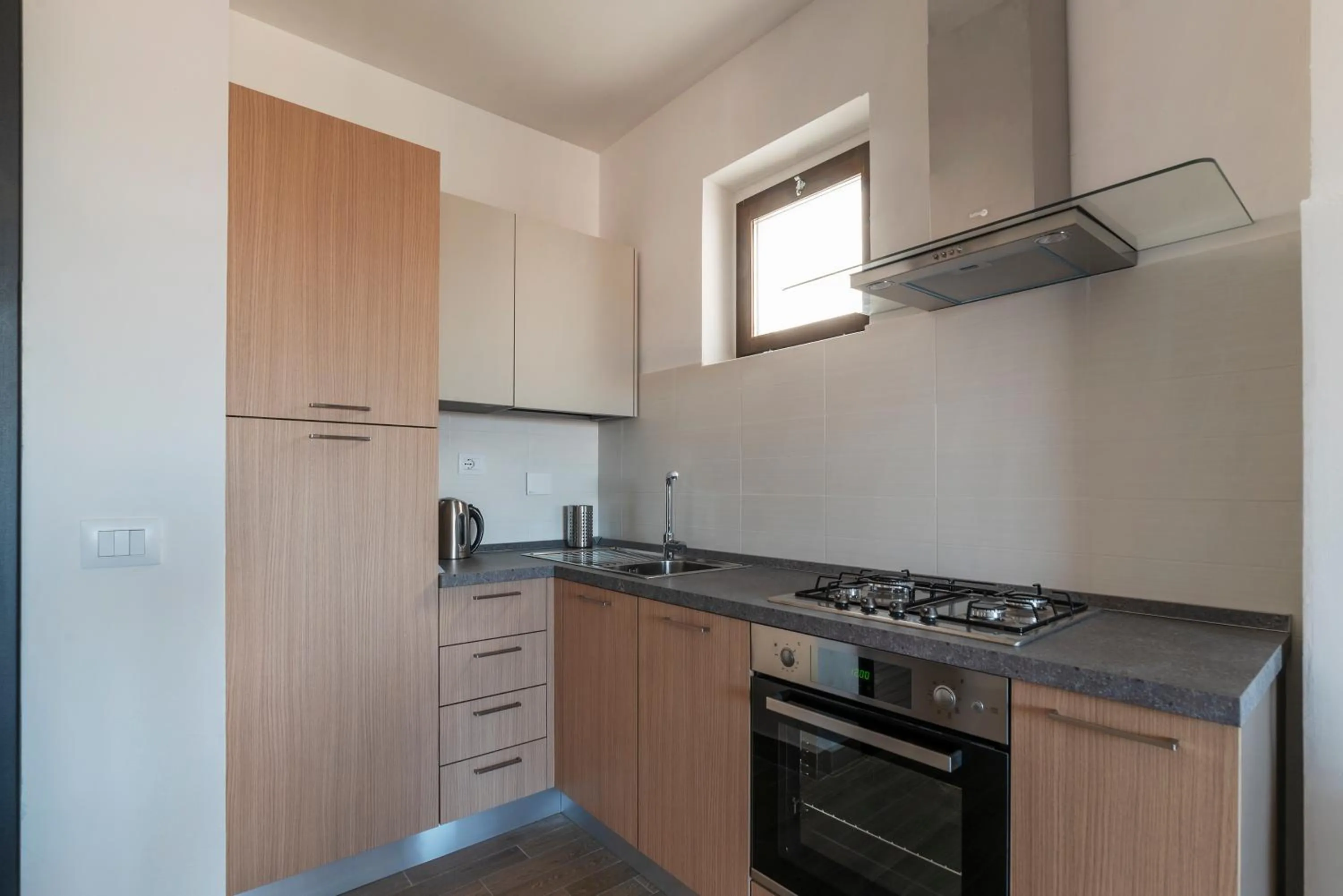 Kitchen or kitchenette in GuestHost - Fonte Laurentina Apartments