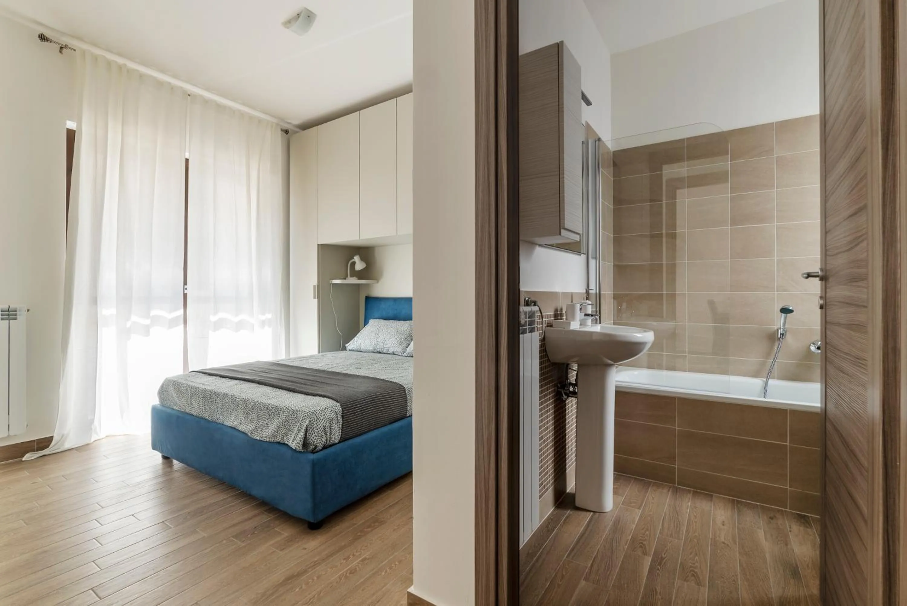 Bathroom, Bed in GuestHost - Fonte Laurentina Apartments