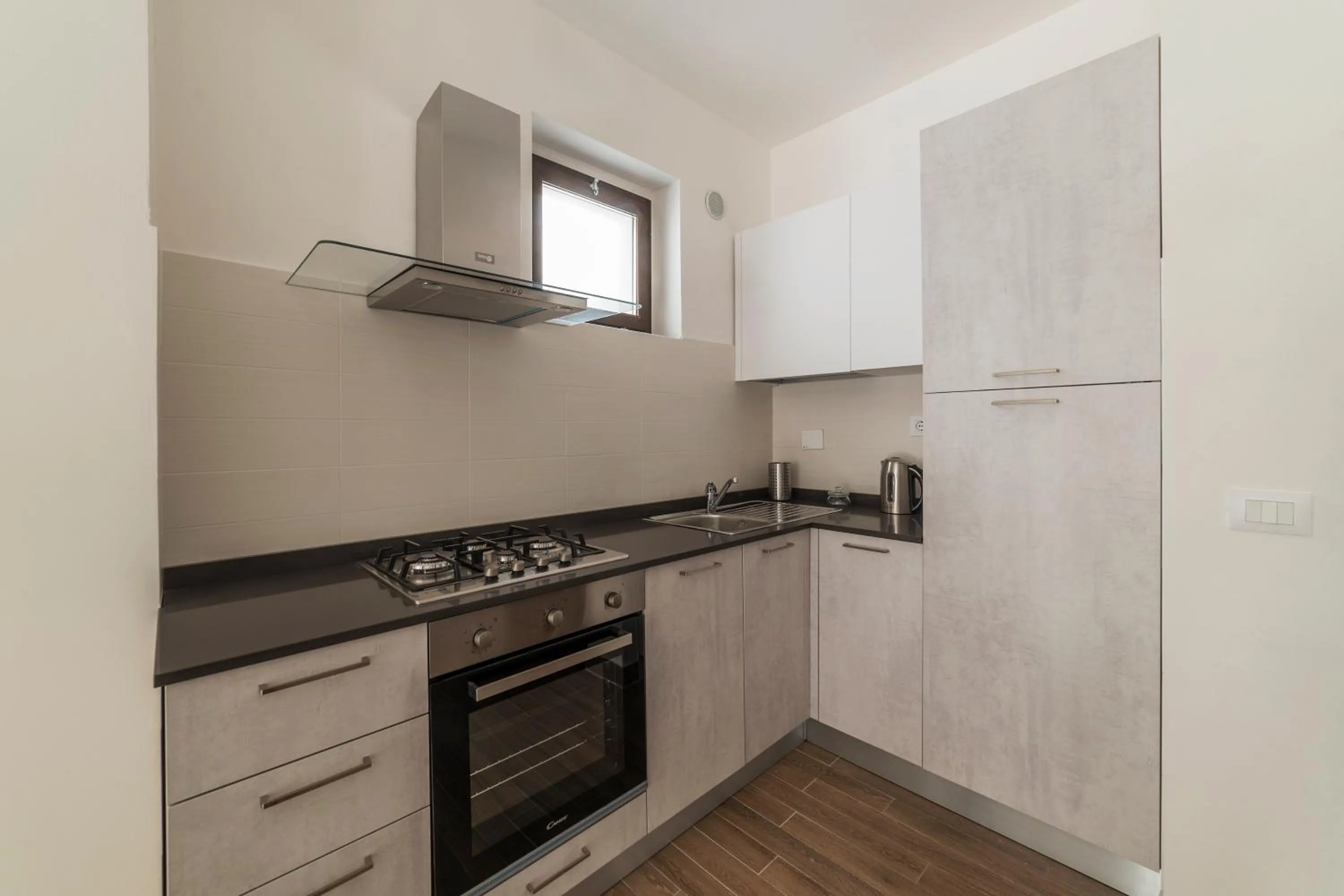 Kitchen or kitchenette in GuestHost - Fonte Laurentina Apartments