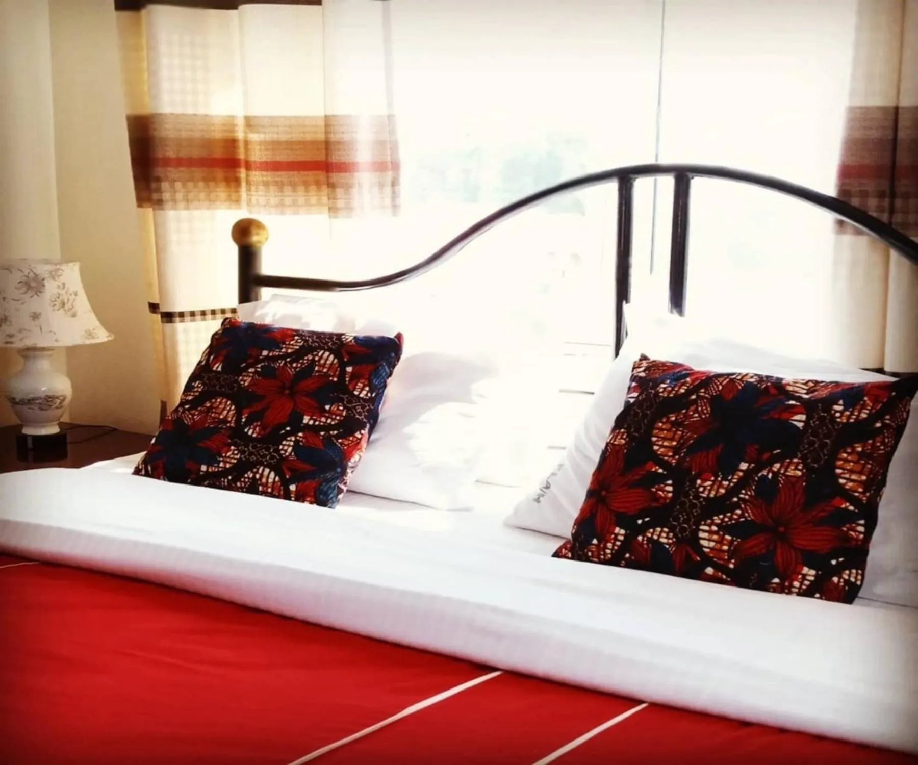 Bed in Karibu BB Suites