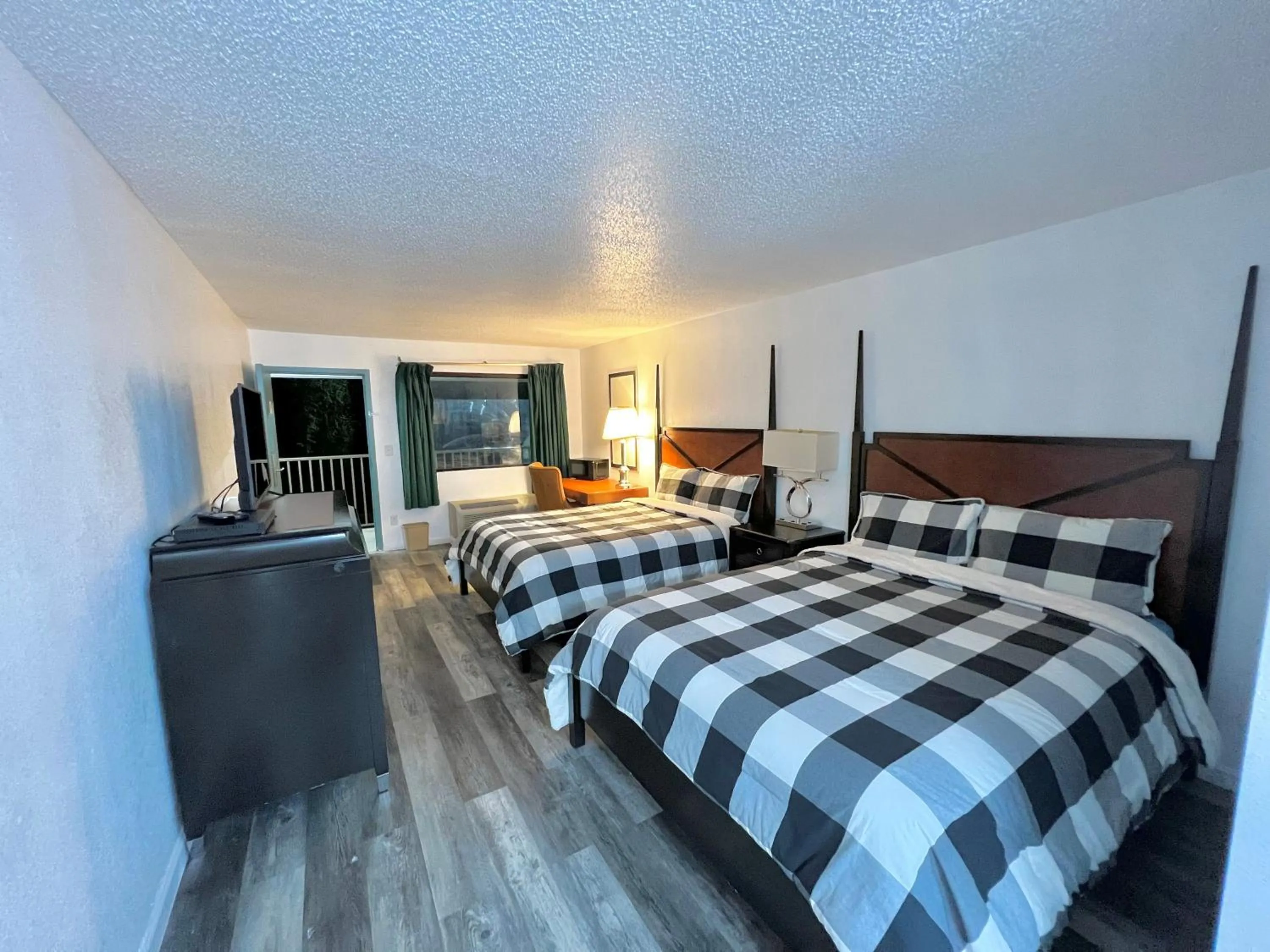 Bedroom in Bayou Inn & Suites