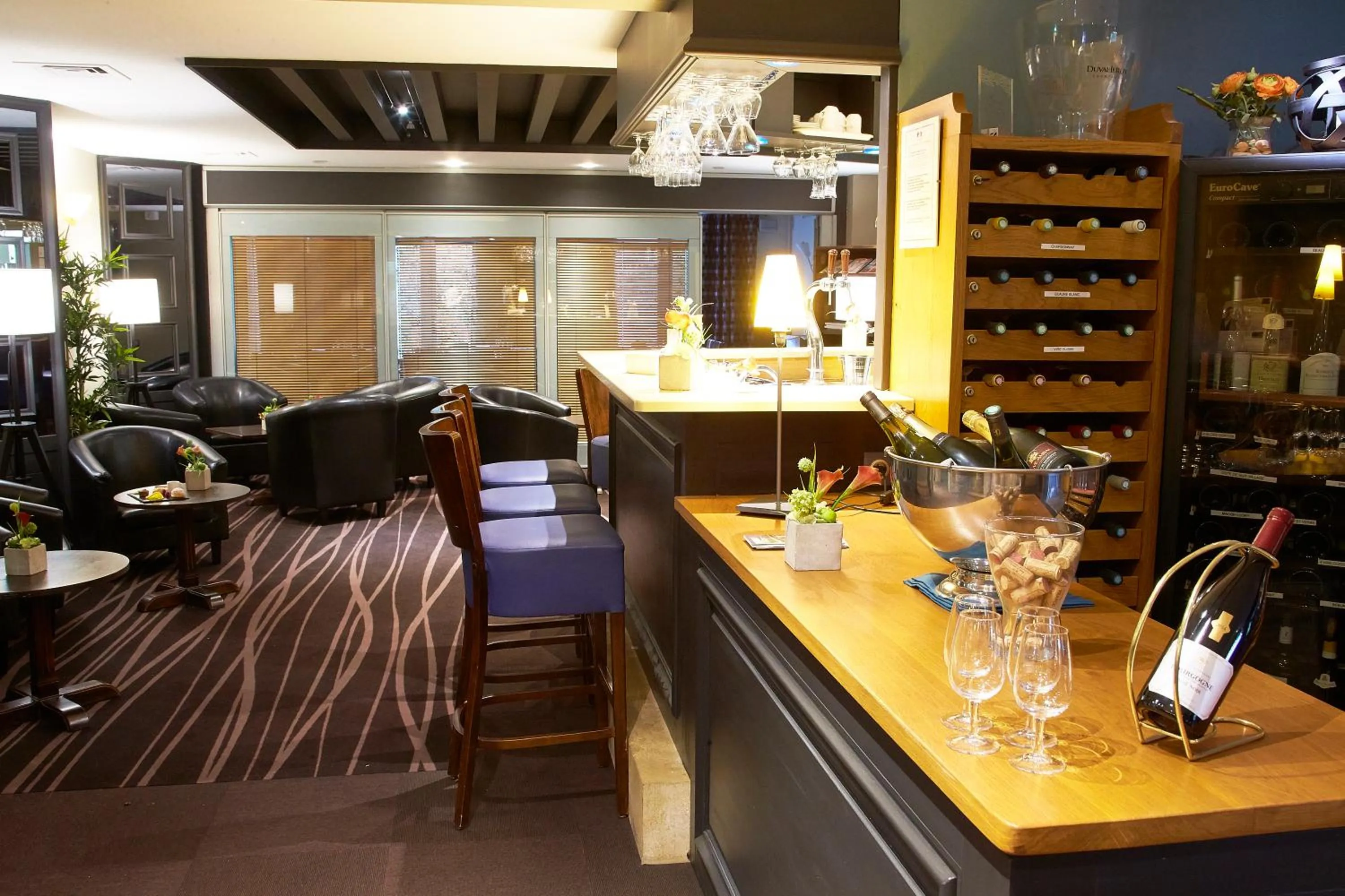 Communal lounge/ TV room in Kyriad Beaune