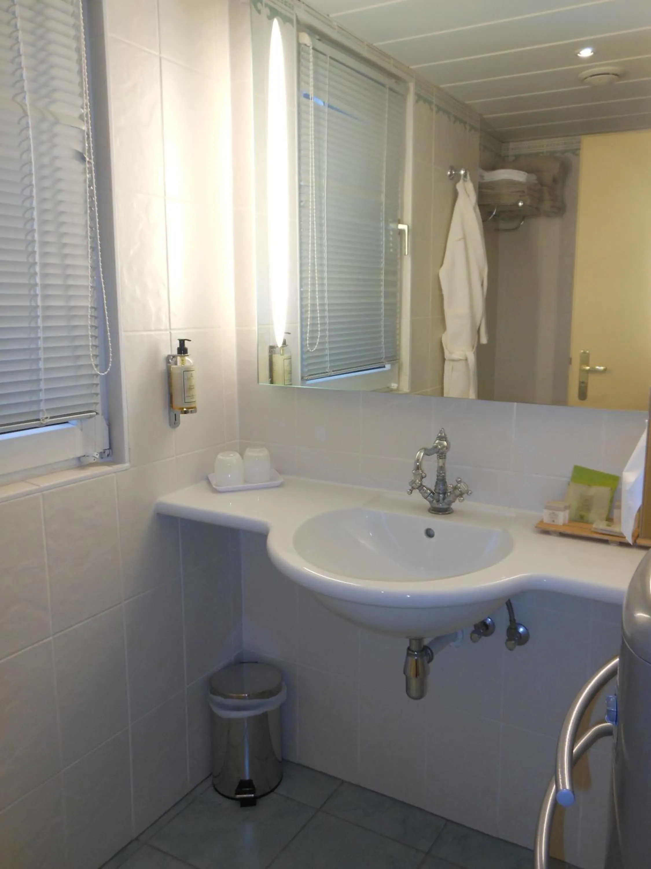 Bathroom in Logis Hôtel Beauséjour Colmar